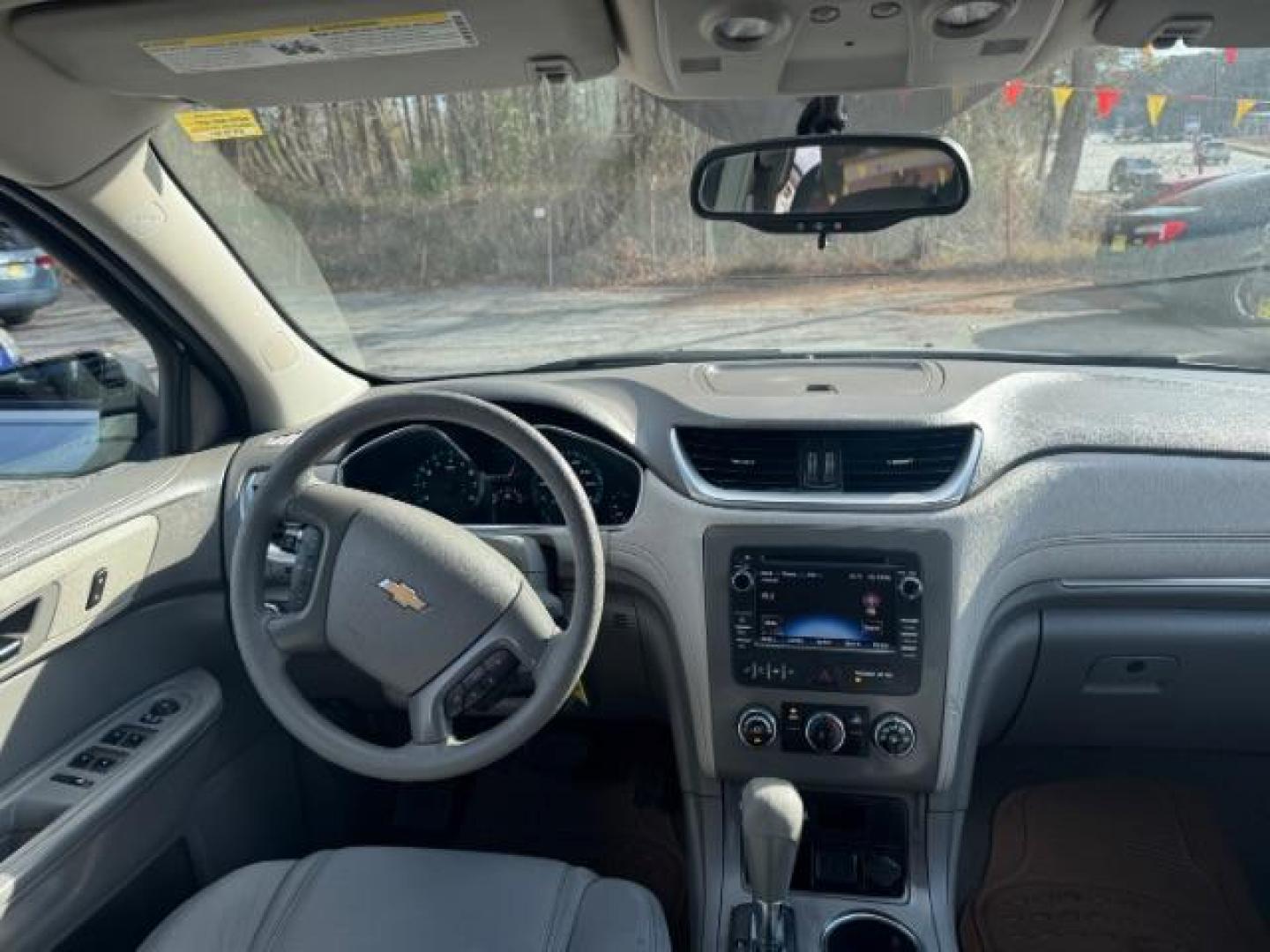 2015 Silver Chevrolet Traverse LS FWD w/PDC (1GNKRFED0FJ) with an 3.6L V6 DOHC 24V engine, 6-Speed Automatic transmission, located at 1806 Veterans Memorial Hwy SW, Austell, GA, 30168, (770) 944-9558, 33.817959, -84.606987 - Photo#12