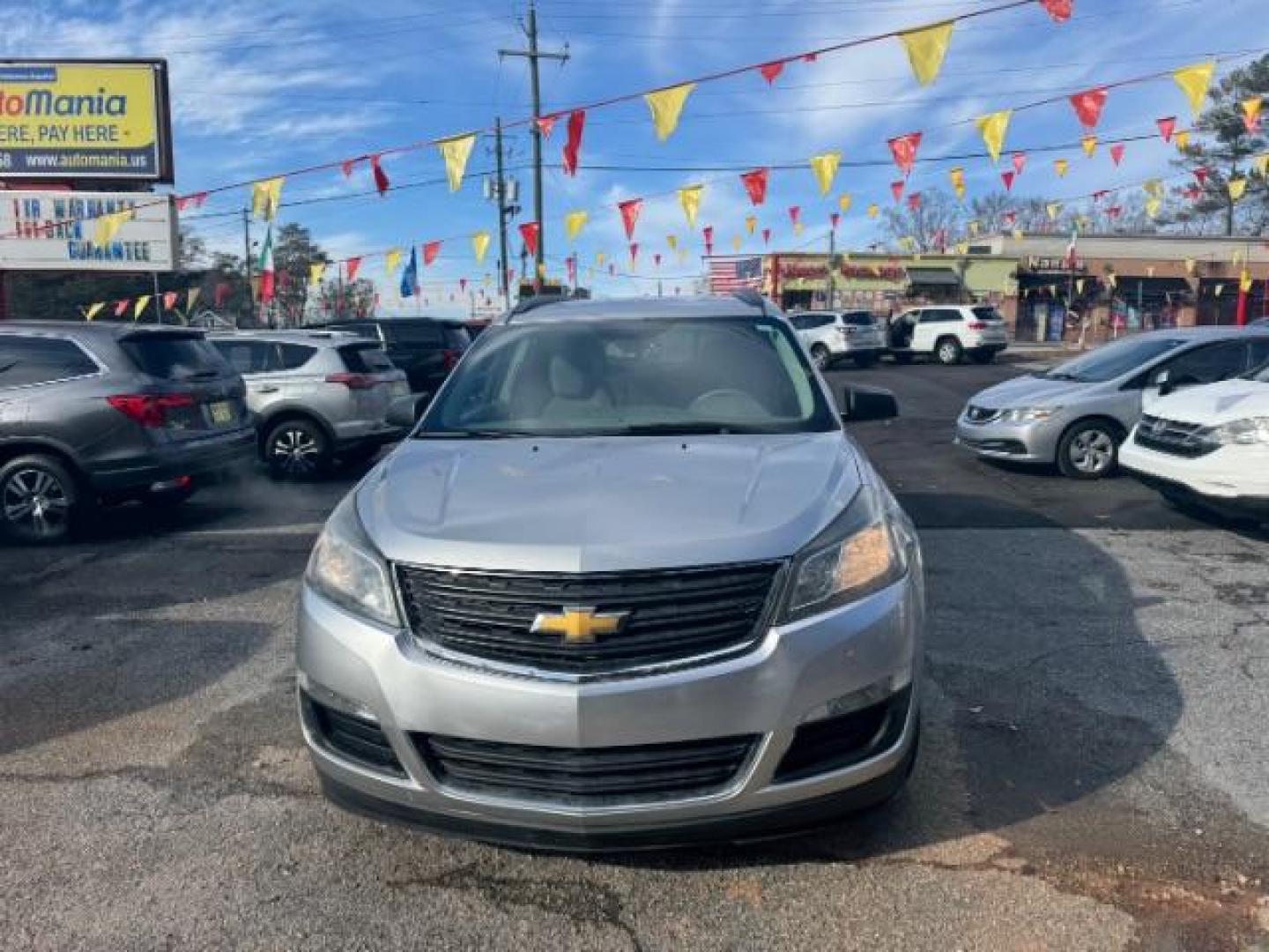 2015 Silver Chevrolet Traverse LS FWD w/PDC (1GNKRFED0FJ) with an 3.6L V6 DOHC 24V engine, 6-Speed Automatic transmission, located at 1806 Veterans Memorial Hwy SW, Austell, GA, 30168, (770) 944-9558, 33.817959, -84.606987 - Photo#1