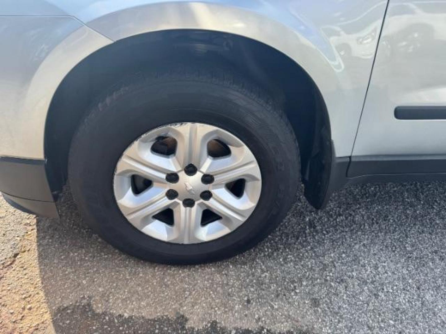 2015 Silver Chevrolet Traverse LS FWD w/PDC (1GNKRFED0FJ) with an 3.6L V6 DOHC 24V engine, 6-Speed Automatic transmission, located at 1806 Veterans Memorial Hwy SW, Austell, GA, 30168, (770) 944-9558, 33.817959, -84.606987 - Photo#20