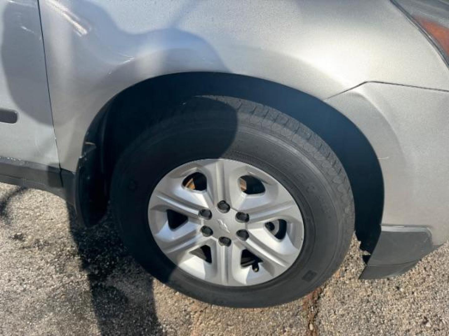 2015 Silver Chevrolet Traverse LS FWD w/PDC (1GNKRFED0FJ) with an 3.6L V6 DOHC 24V engine, 6-Speed Automatic transmission, located at 1806 Veterans Memorial Hwy SW, Austell, GA, 30168, (770) 944-9558, 33.817959, -84.606987 - Photo#21