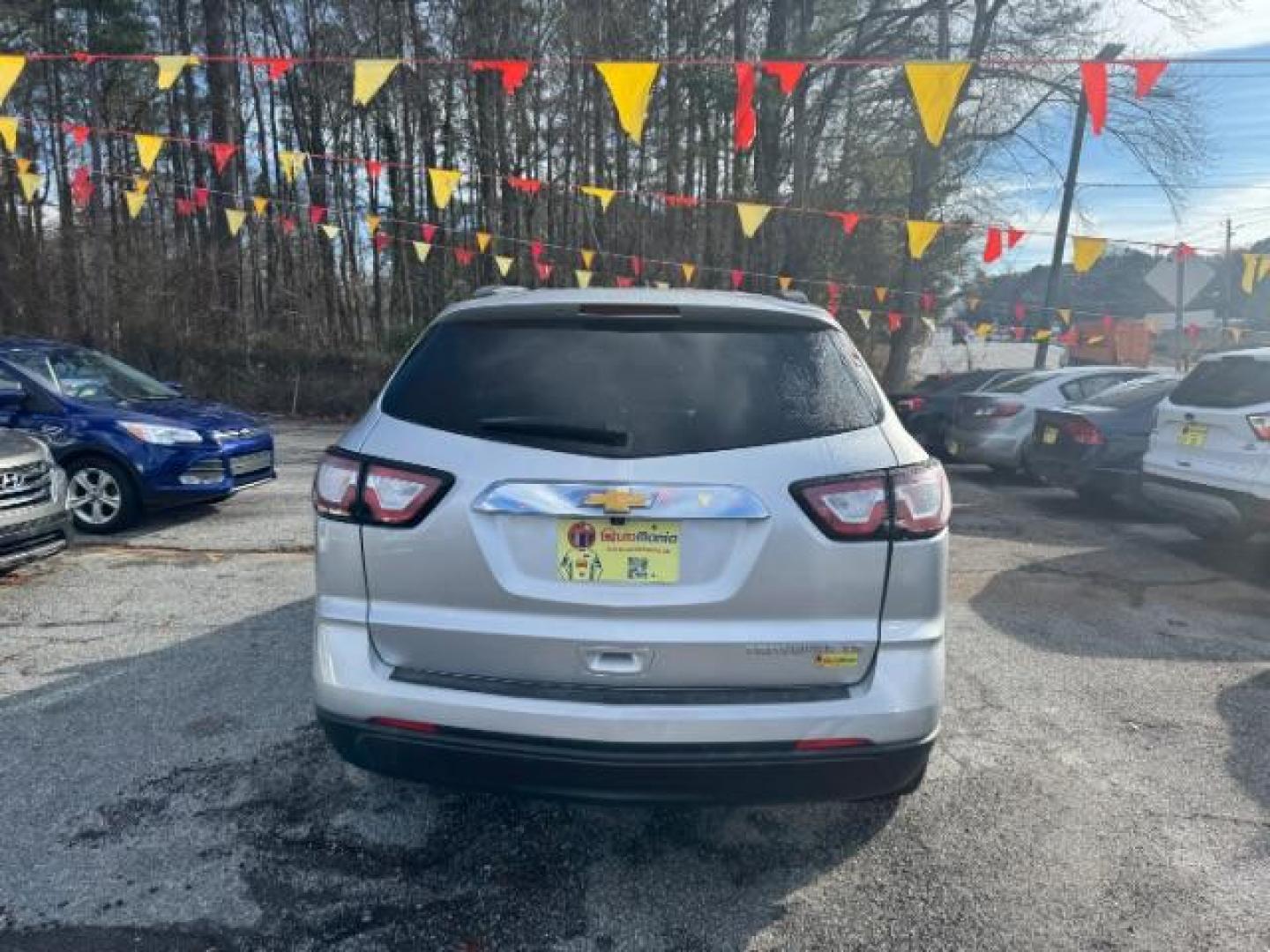 2015 Silver Chevrolet Traverse LS FWD w/PDC (1GNKRFED0FJ) with an 3.6L V6 DOHC 24V engine, 6-Speed Automatic transmission, located at 1806 Veterans Memorial Hwy SW, Austell, GA, 30168, (770) 944-9558, 33.817959, -84.606987 - Photo#4