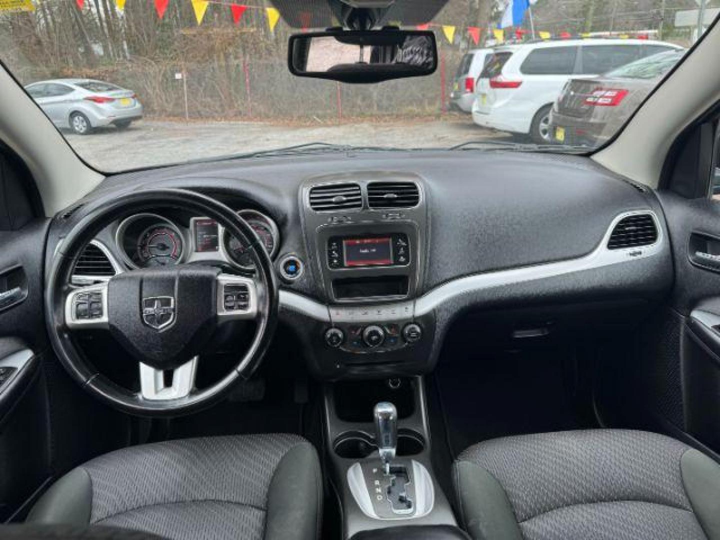 2012 Black Dodge Journey SXT (3C4PDCBG1CT) with an 3.6L V6 DOHC 24V engine, 6-Speed Automatic transmission, located at 1806 Veterans Memorial Hwy SW, Austell, GA, 30168, (770) 944-9558, 33.817959, -84.606987 - Photo#11