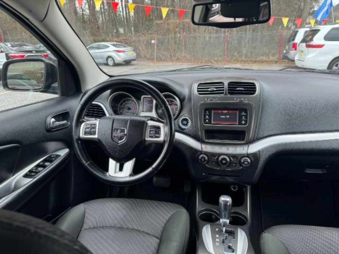 2012 Black Dodge Journey SXT (3C4PDCBG1CT) with an 3.6L V6 DOHC 24V engine, 6-Speed Automatic transmission, located at 1806 Veterans Memorial Hwy SW, Austell, GA, 30168, (770) 944-9558, 33.817959, -84.606987 - Photo#12