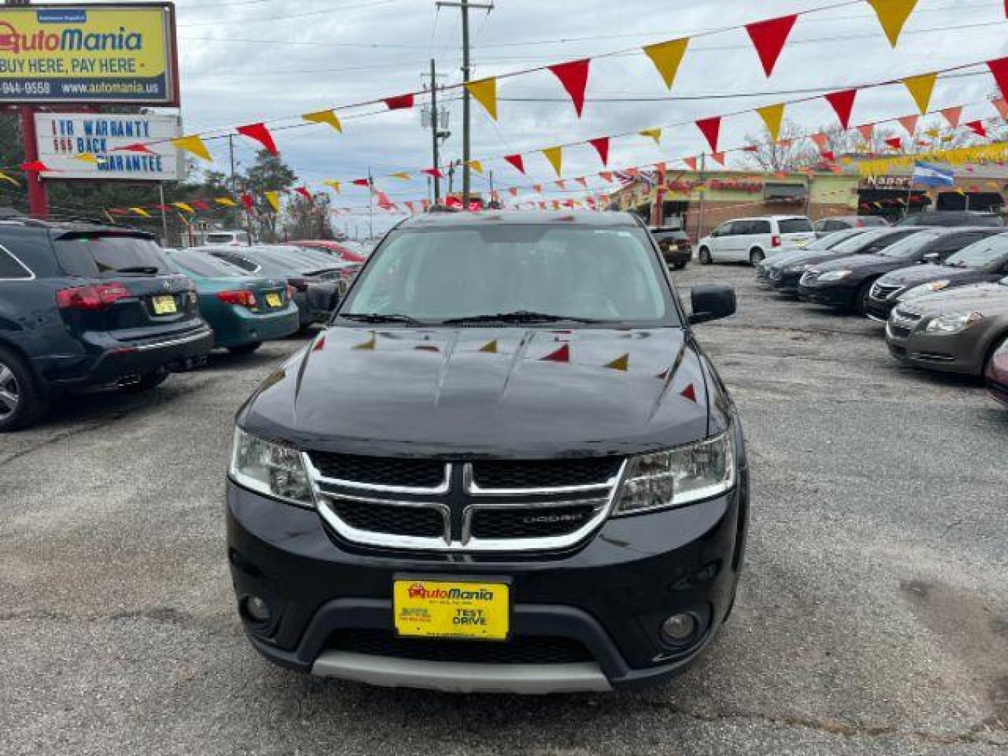 2012 Black Dodge Journey SXT (3C4PDCBG1CT) with an 3.6L V6 DOHC 24V engine, 6-Speed Automatic transmission, located at 1806 Veterans Memorial Hwy SW, Austell, GA, 30168, (770) 944-9558, 33.817959, -84.606987 - Photo#1