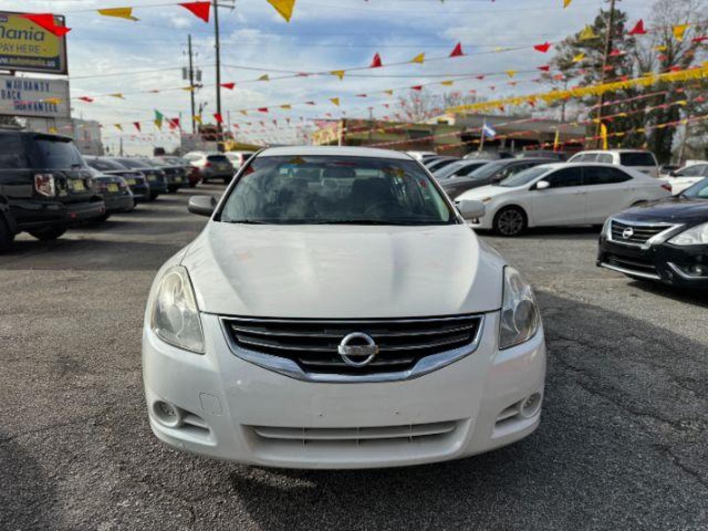 2012 White Nissan Altima 2.5 (1N4AL2APXCC) with an 2.5L L4 DOHC 16V engine, 6-Speed Manual transmission, located at 1806 Veterans Memorial Hwy SW, Austell, GA, 30168, (770) 944-9558, 33.817959, -84.606987 - Photo#1