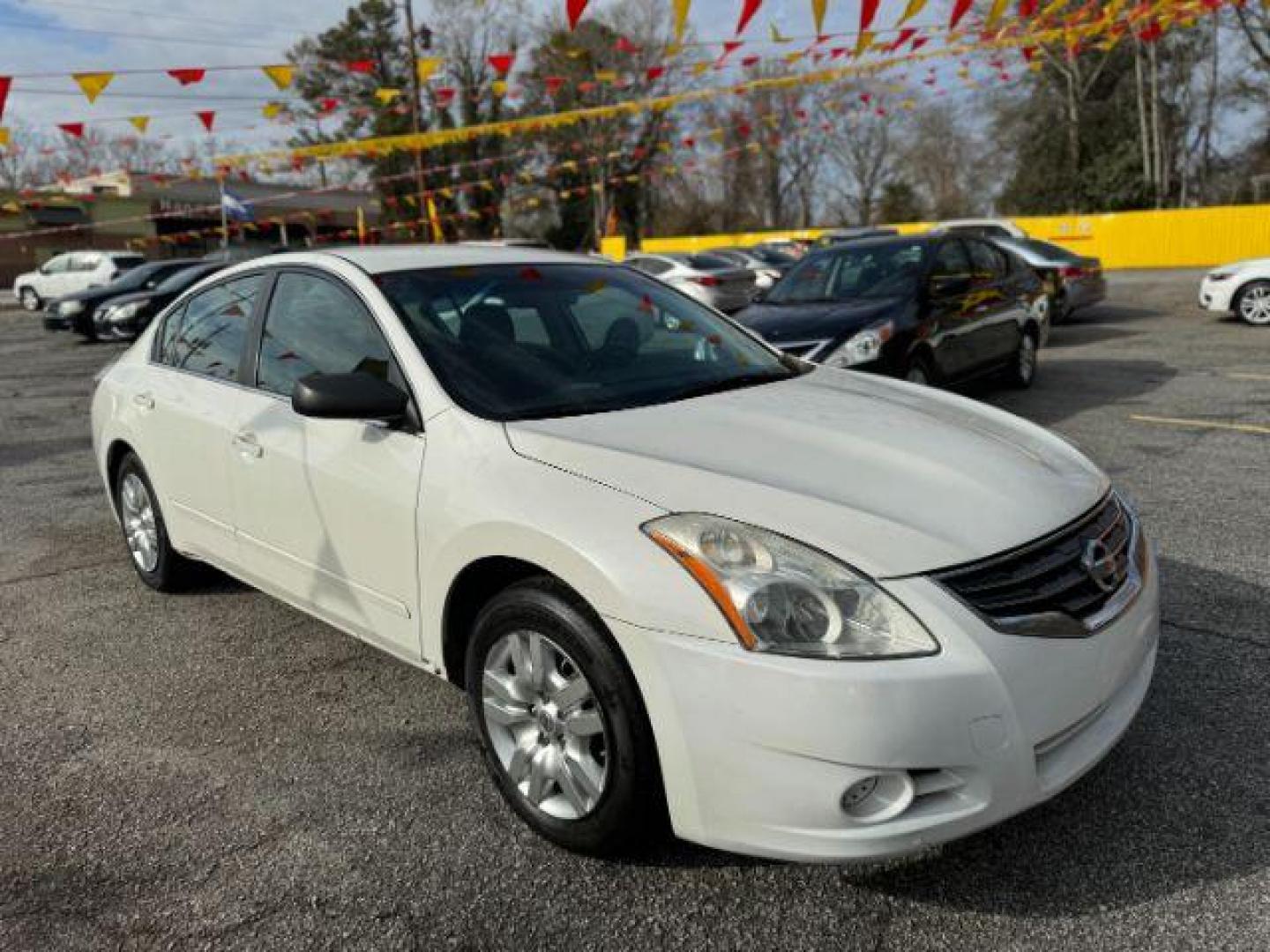 2012 White Nissan Altima 2.5 (1N4AL2APXCC) with an 2.5L L4 DOHC 16V engine, 6-Speed Manual transmission, located at 1806 Veterans Memorial Hwy SW, Austell, GA, 30168, (770) 944-9558, 33.817959, -84.606987 - Photo#2