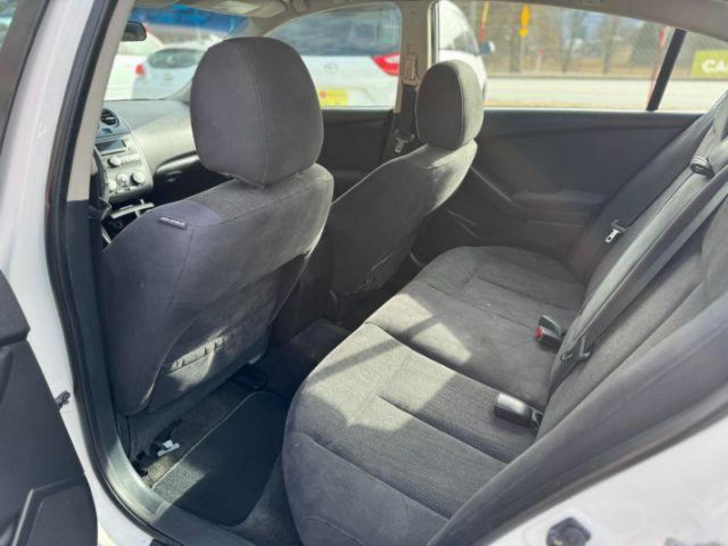 2012 White Nissan Altima 2.5 (1N4AL2APXCC) with an 2.5L L4 DOHC 16V engine, 6-Speed Manual transmission, located at 1806 Veterans Memorial Hwy SW, Austell, GA, 30168, (770) 944-9558, 33.817959, -84.606987 - Photo#9