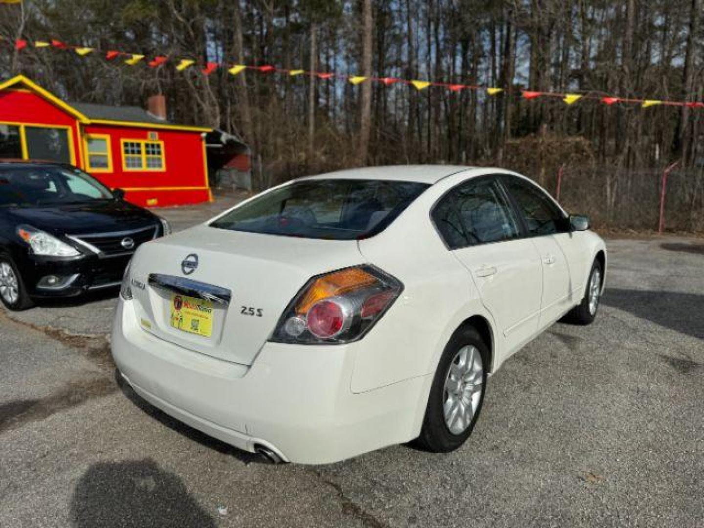 2012 White Nissan Altima 2.5 (1N4AL2APXCC) with an 2.5L L4 DOHC 16V engine, 6-Speed Manual transmission, located at 1806 Veterans Memorial Hwy SW, Austell, GA, 30168, (770) 944-9558, 33.817959, -84.606987 - Photo#3