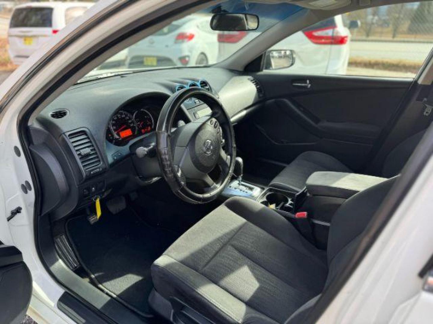 2012 White Nissan Altima 2.5 (1N4AL2APXCC) with an 2.5L L4 DOHC 16V engine, 6-Speed Manual transmission, located at 1806 Veterans Memorial Hwy SW, Austell, GA, 30168, (770) 944-9558, 33.817959, -84.606987 - Photo#6