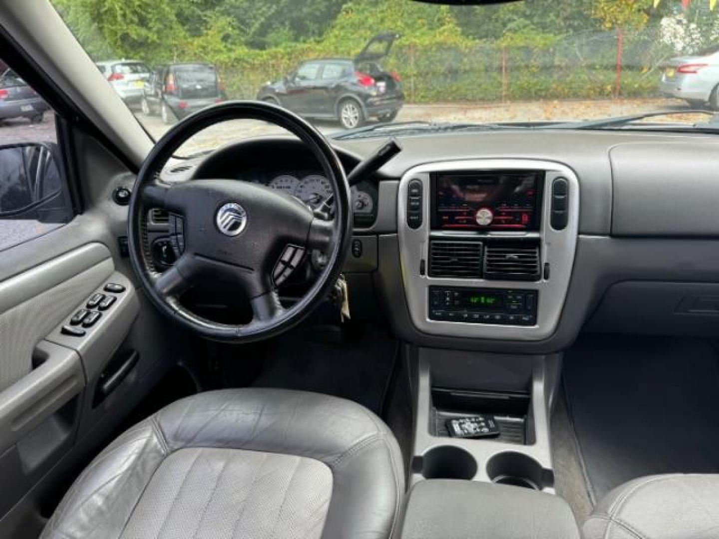 2003 Silver Mercury Mountaineer Convenience 4.6L AWD (4M2ZU86W73Z) with an 4.6L V8 SOHC 12V engine, 5-Speed Automatic transmission, located at 1806 Veterans Memorial Hwy SW, Austell, GA, 30168, (770) 944-9558, 33.817959, -84.606987 - Photo#12