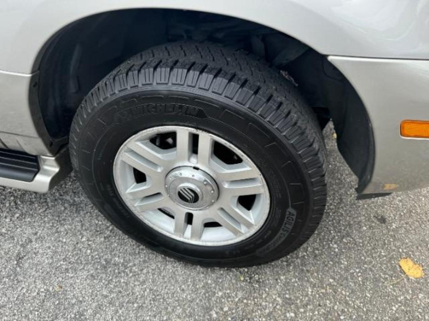 2003 Silver Mercury Mountaineer Convenience 4.6L AWD (4M2ZU86W73Z) with an 4.6L V8 SOHC 12V engine, 5-Speed Automatic transmission, located at 1806 Veterans Memorial Hwy SW, Austell, GA, 30168, (770) 944-9558, 33.817959, -84.606987 - Photo#21