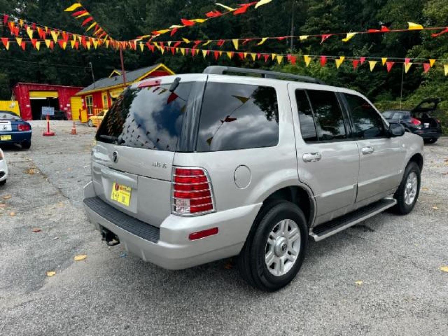 2003 Silver Mercury Mountaineer Convenience 4.6L AWD (4M2ZU86W73Z) with an 4.6L V8 SOHC 12V engine, 5-Speed Automatic transmission, located at 1806 Veterans Memorial Hwy SW, Austell, GA, 30168, (770) 944-9558, 33.817959, -84.606987 - Photo#3