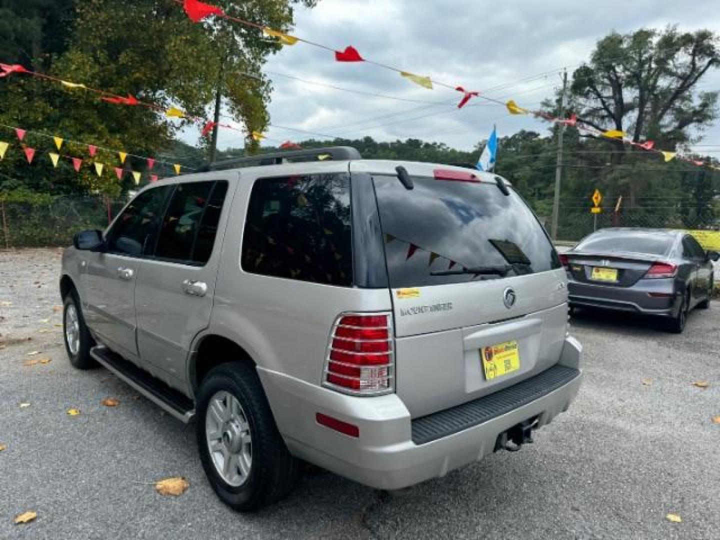 2003 Silver Mercury Mountaineer Convenience 4.6L AWD (4M2ZU86W73Z) with an 4.6L V8 SOHC 12V engine, 5-Speed Automatic transmission, located at 1806 Veterans Memorial Hwy SW, Austell, GA, 30168, (770) 944-9558, 33.817959, -84.606987 - Photo#5