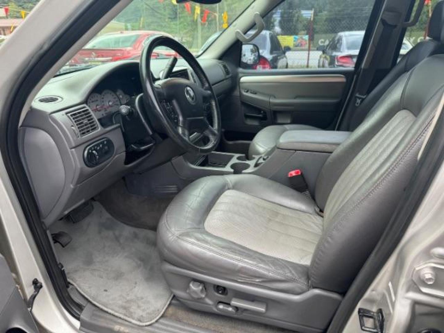 2003 Silver Mercury Mountaineer Convenience 4.6L AWD (4M2ZU86W73Z) with an 4.6L V8 SOHC 12V engine, 5-Speed Automatic transmission, located at 1806 Veterans Memorial Hwy SW, Austell, GA, 30168, (770) 944-9558, 33.817959, -84.606987 - Photo#6