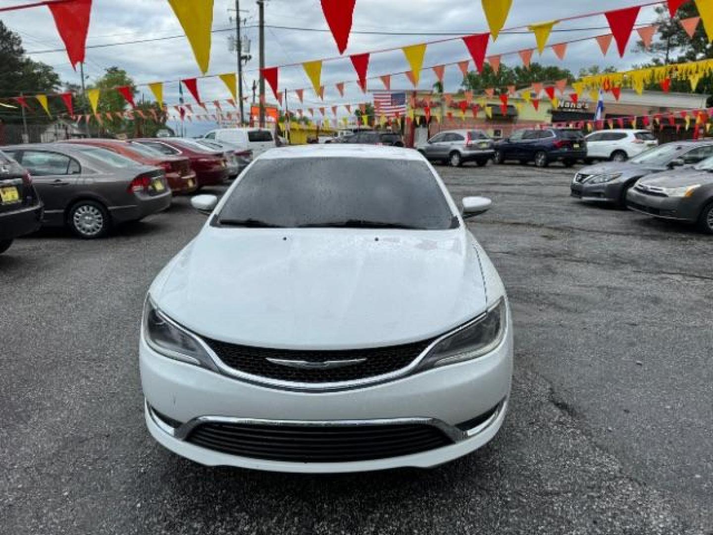 2015 White Chrysler 200 Limited (1C3CCCAB4FN) with an 2.4L L4 DOHC 16V engine, 9-Speed Automatic transmission, located at 1806 Veterans Memorial Hwy SW, Austell, GA, 30168, (770) 944-9558, 33.817959, -84.606987 - Photo#1