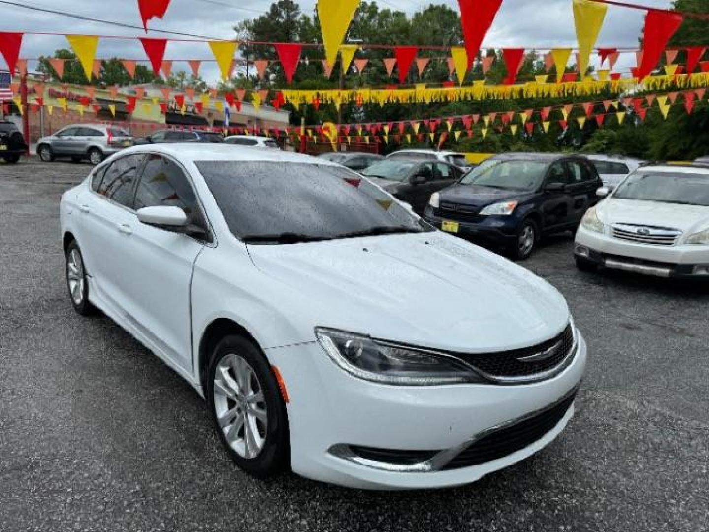 2015 White Chrysler 200 Limited (1C3CCCAB4FN) with an 2.4L L4 DOHC 16V engine, 9-Speed Automatic transmission, located at 1806 Veterans Memorial Hwy SW, Austell, GA, 30168, (770) 944-9558, 33.817959, -84.606987 - Photo#2