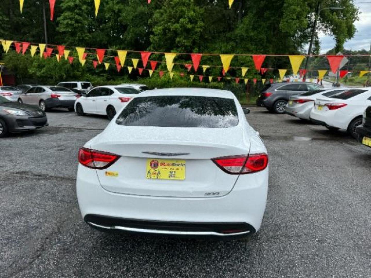 2015 White Chrysler 200 Limited (1C3CCCAB4FN) with an 2.4L L4 DOHC 16V engine, 9-Speed Automatic transmission, located at 1806 Veterans Memorial Hwy SW, Austell, GA, 30168, (770) 944-9558, 33.817959, -84.606987 - Photo#4