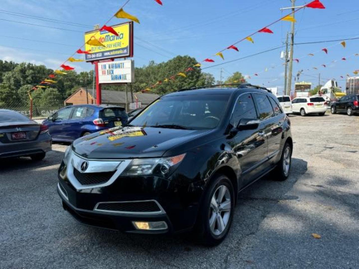 2011 Black Acura MDX 6-Spd AT (2HNYD2H22BH) with an 3.7L V6 SOHC 24V engine, 6-Speed Automatic transmission, located at 1806 Veterans Memorial Hwy SW, Austell, GA, 30168, (770) 944-9558, 33.817959, -84.606987 - Photo#0