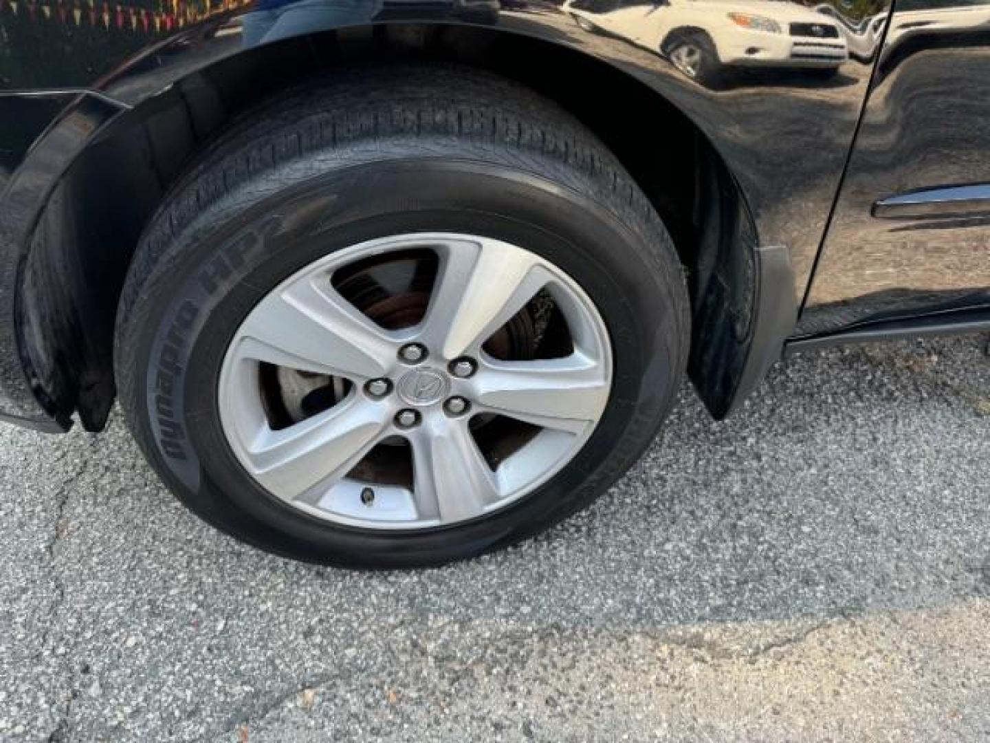 2011 Black Acura MDX 6-Spd AT (2HNYD2H22BH) with an 3.7L V6 SOHC 24V engine, 6-Speed Automatic transmission, located at 1806 Veterans Memorial Hwy SW, Austell, GA, 30168, (770) 944-9558, 33.817959, -84.606987 - Photo#21