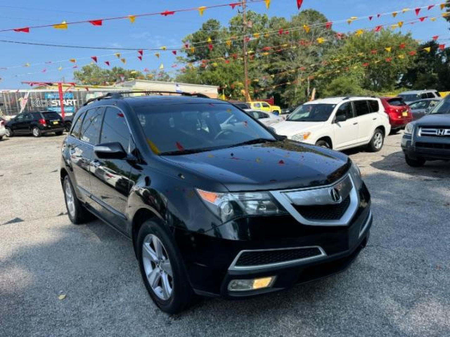 2011 Black Acura MDX 6-Spd AT (2HNYD2H22BH) with an 3.7L V6 SOHC 24V engine, 6-Speed Automatic transmission, located at 1806 Veterans Memorial Hwy SW, Austell, GA, 30168, (770) 944-9558, 33.817959, -84.606987 - Photo#2