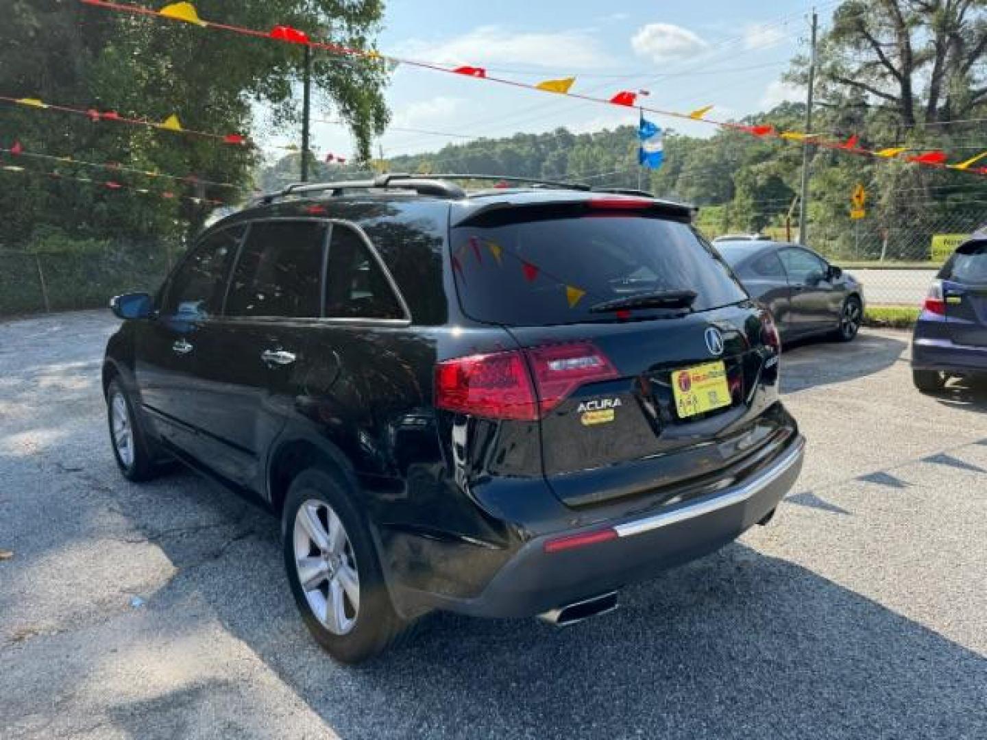 2011 Black Acura MDX 6-Spd AT (2HNYD2H22BH) with an 3.7L V6 SOHC 24V engine, 6-Speed Automatic transmission, located at 1806 Veterans Memorial Hwy SW, Austell, GA, 30168, (770) 944-9558, 33.817959, -84.606987 - Photo#5