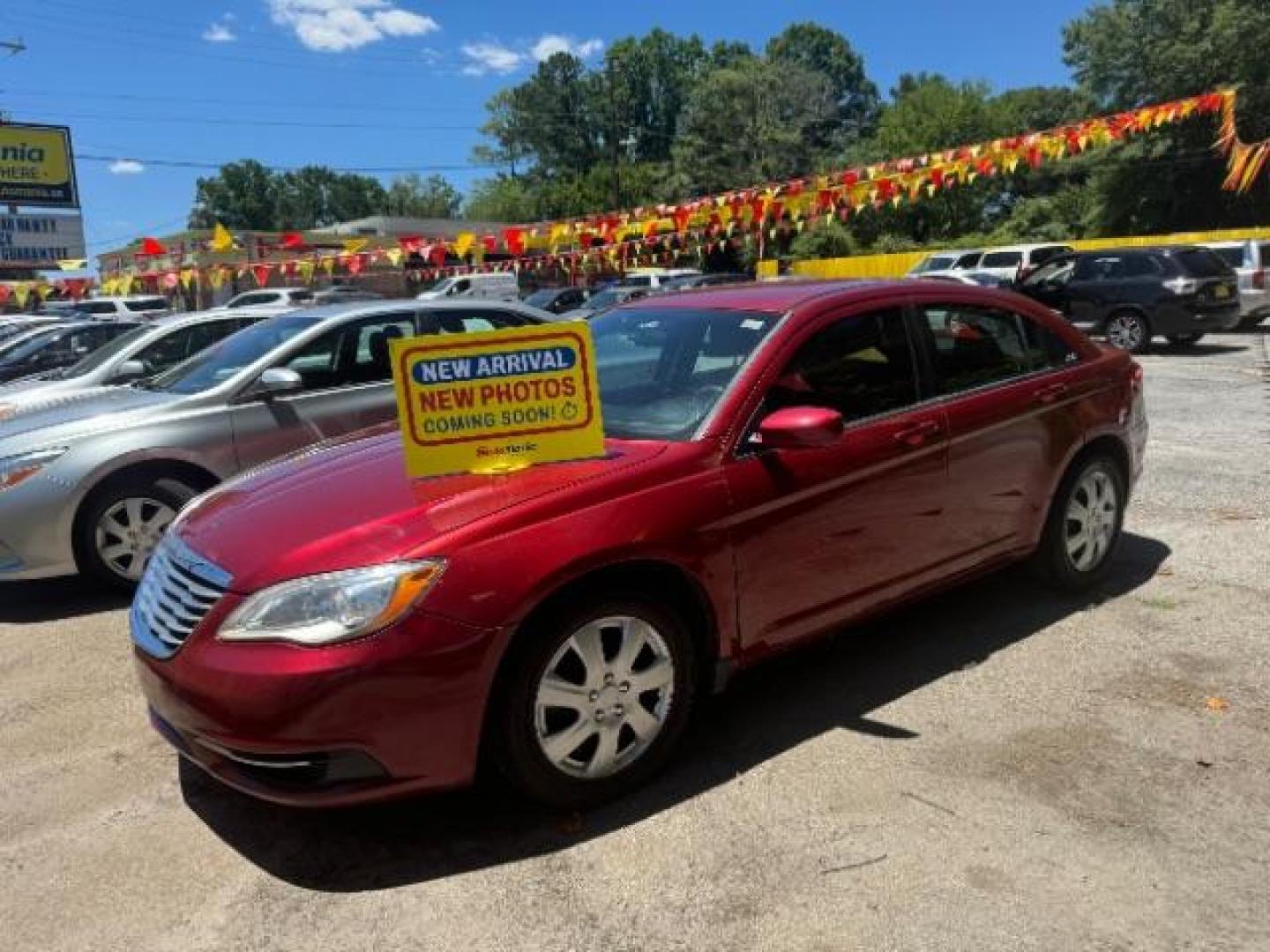 2014 Red Chrysler 200 LX (1C3CCBAB9EN) with an 2.4L L4 DOHC 16V engine, 6-Speed Automatic transmission, located at 1806 Veterans Memorial Hwy SW, Austell, GA, 30168, (770) 944-9558, 33.817959, -84.606987 - Photo#0