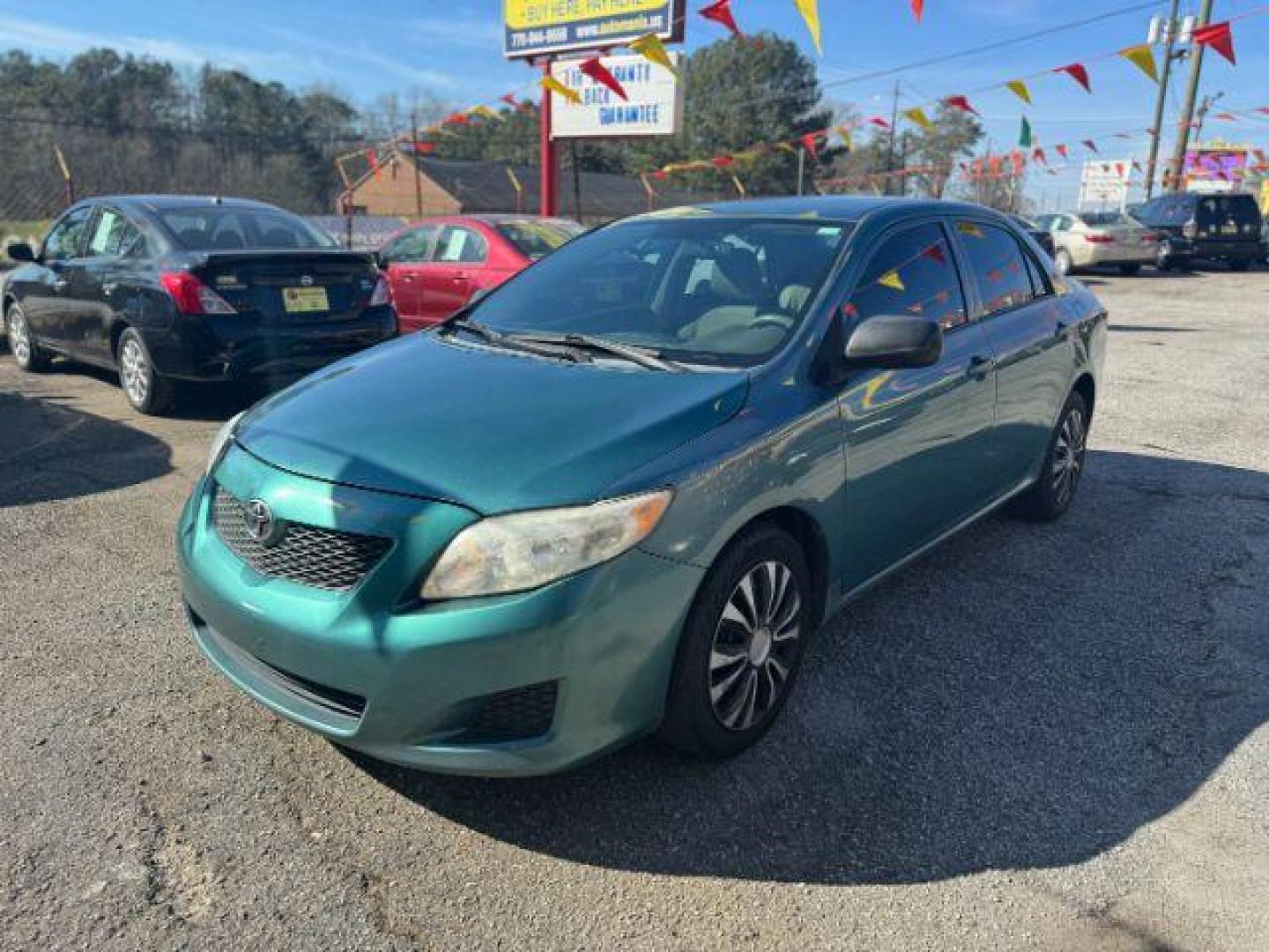 2010 Green Toyota Corolla LE 4-Speed AT (2T1BU4EE6AC) with an 1.8L L4 DOHC 16V engine, 4-Speed Automatic transmission, located at 1806 Veterans Memorial Hwy SW, Austell, GA, 30168, (770) 944-9558, 33.817959, -84.606987 - Photo#0