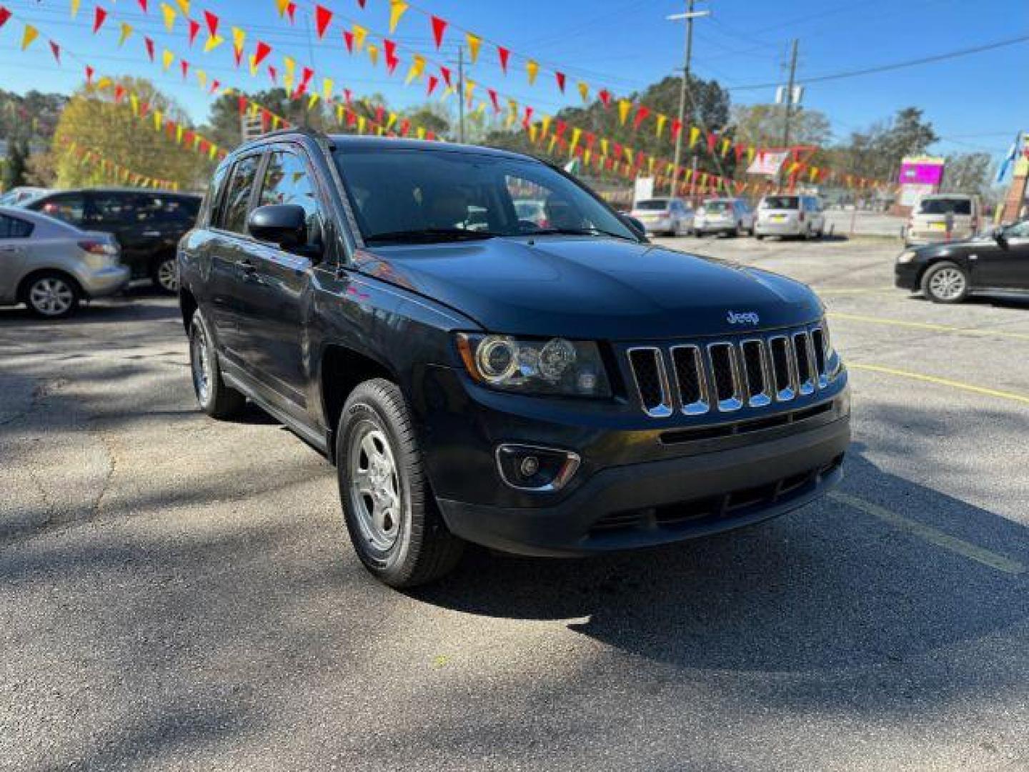 2015 Gray Jeep Compass Limited FWD (1C4NJCCB4FD) with an 2.4L L4 DOHC 16V engine, Continuously Variable Transmission transmission, located at 1806 Veterans Memorial Hwy SW, Austell, GA, 30168, (770) 944-9558, 33.817959, -84.606987 - Photo#2