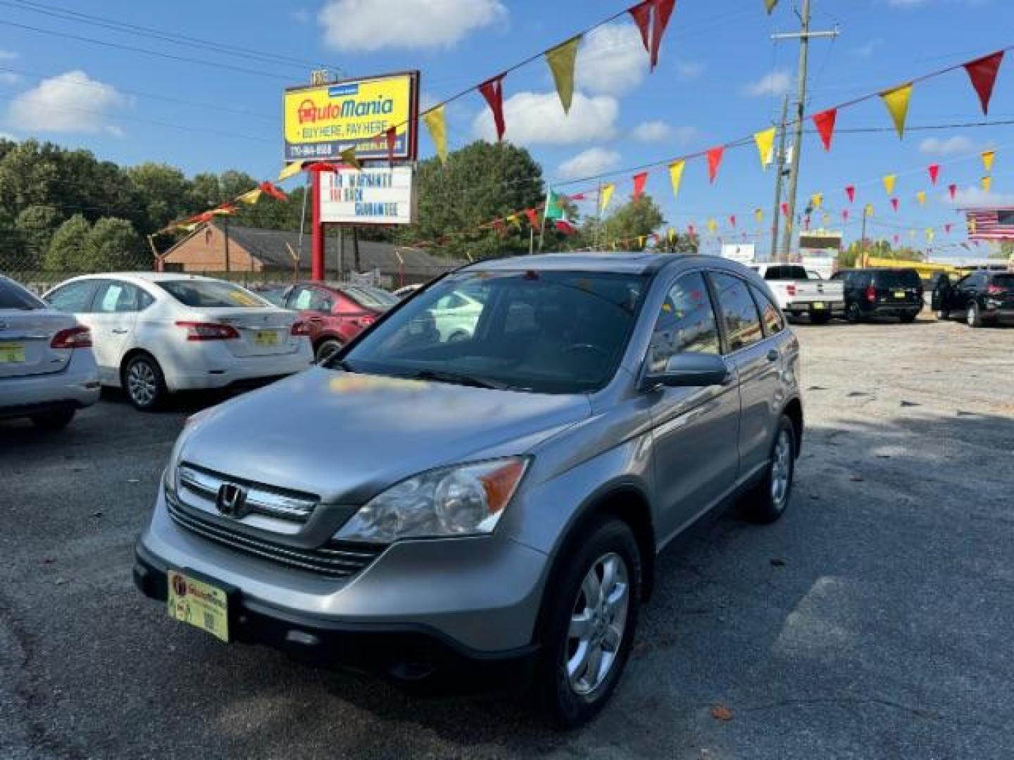 2008 Silver Honda CR-V EX-L 2WD AT (JHLRE38788C) with an 2.4L L4 DOHC 16V engine, 5-Speed Automatic transmission, located at 1806 Veterans Memorial Hwy SW, Austell, GA, 30168, (770) 944-9558, 33.817959, -84.606987 - Photo#0