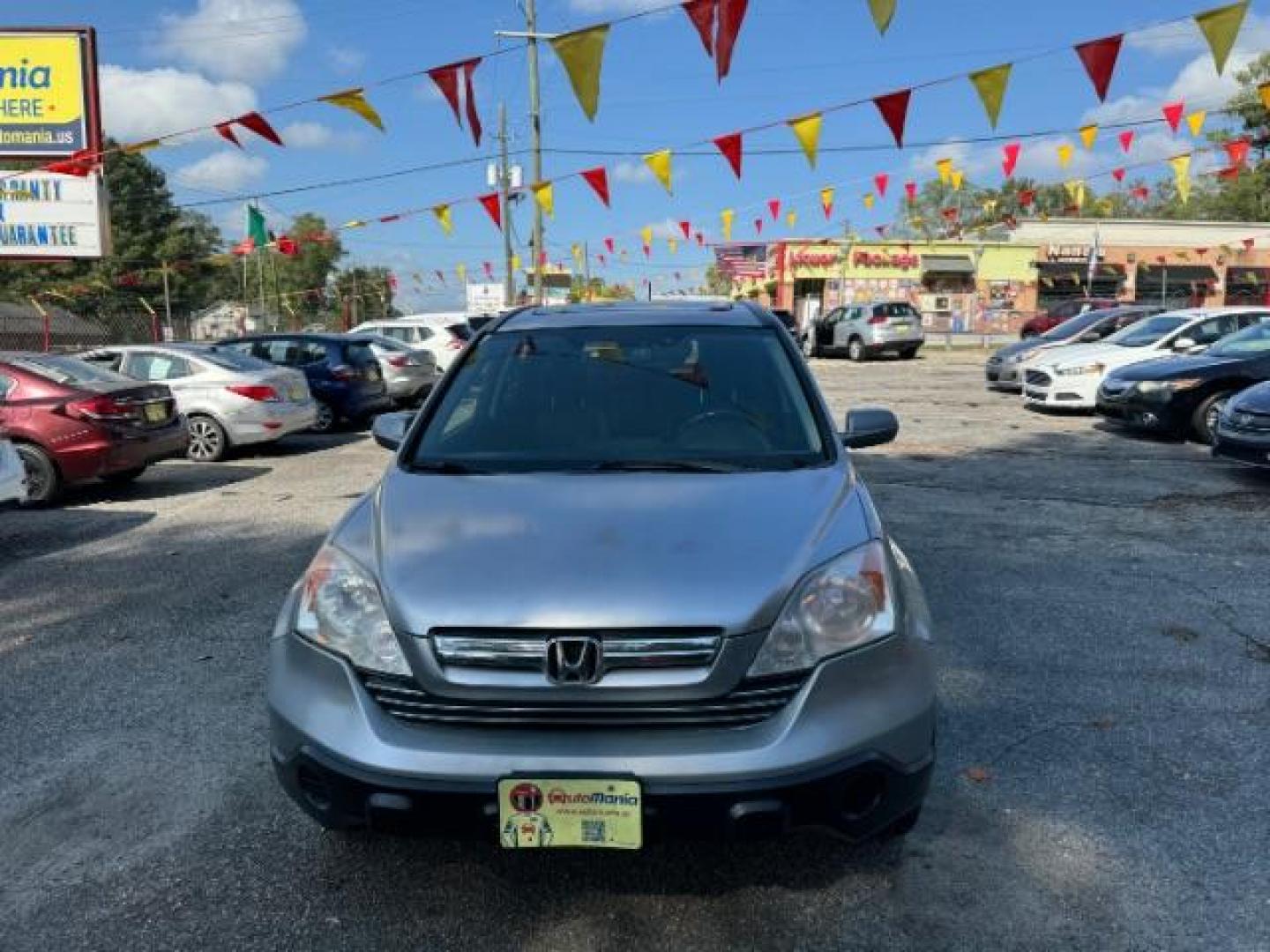 2008 Silver Honda CR-V EX-L 2WD AT (JHLRE38788C) with an 2.4L L4 DOHC 16V engine, 5-Speed Automatic transmission, located at 1806 Veterans Memorial Hwy SW, Austell, GA, 30168, (770) 944-9558, 33.817959, -84.606987 - Photo#1