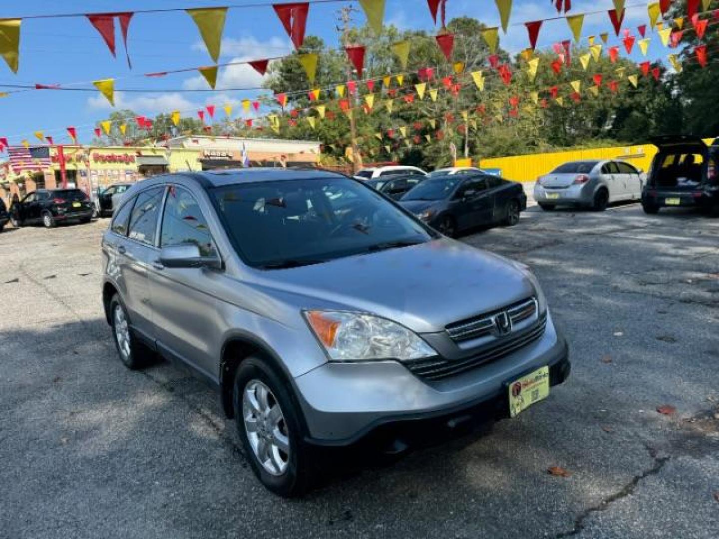 2008 Silver Honda CR-V EX-L 2WD AT (JHLRE38788C) with an 2.4L L4 DOHC 16V engine, 5-Speed Automatic transmission, located at 1806 Veterans Memorial Hwy SW, Austell, GA, 30168, (770) 944-9558, 33.817959, -84.606987 - Photo#2