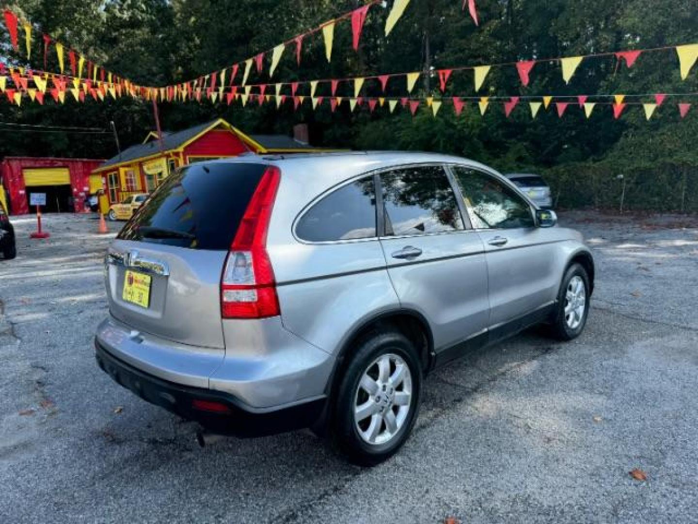 2008 Silver Honda CR-V EX-L 2WD AT (JHLRE38788C) with an 2.4L L4 DOHC 16V engine, 5-Speed Automatic transmission, located at 1806 Veterans Memorial Hwy SW, Austell, GA, 30168, (770) 944-9558, 33.817959, -84.606987 - Photo#3