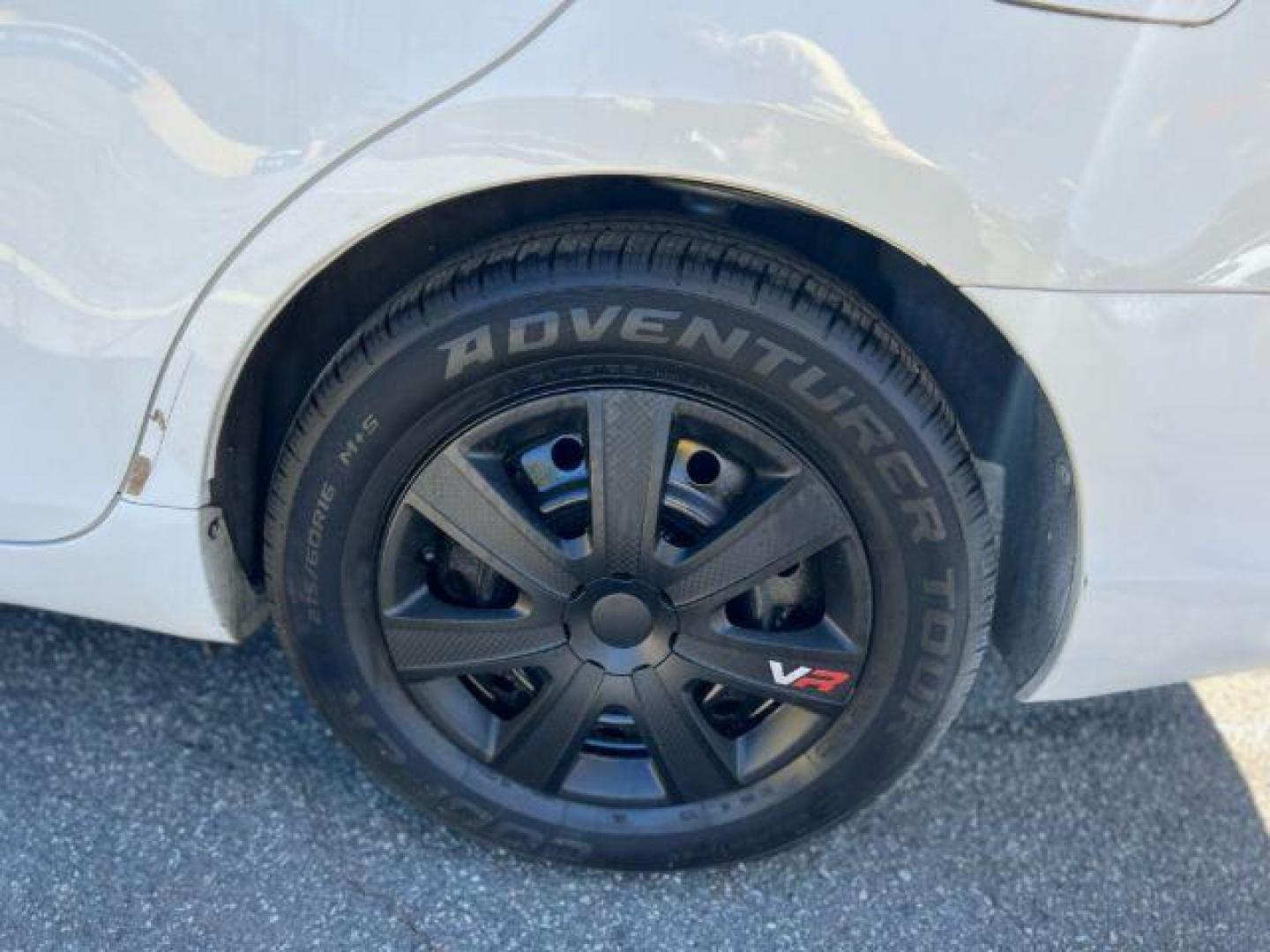 2007 White Toyota Camry LE 5-Spd AT (JTNBE46K773) with an 2.4L L4 DOHC 16V engine, 5-Speed Automatic transmission, located at 1806 Veterans Memorial Hwy SW, Austell, GA, 30168, (770) 944-9558, 33.817959, -84.606987 - Photo#21