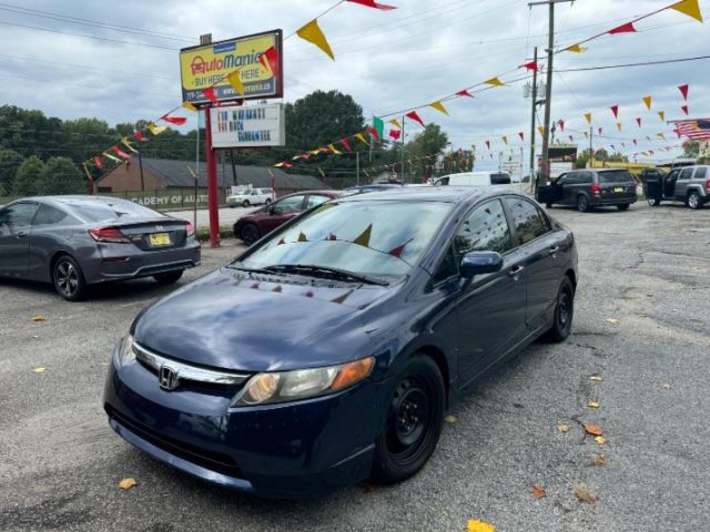 2007 Blue Honda Civic LX Sedan AT (1HGFA16527L) with an 1.8L L4 SOHC 16V engine, 5-Speed Automatic transmission, located at 1806 Veterans Memorial Hwy SW, Austell, GA, 30168, (770) 944-9558, 33.817959, -84.606987 - Photo#0