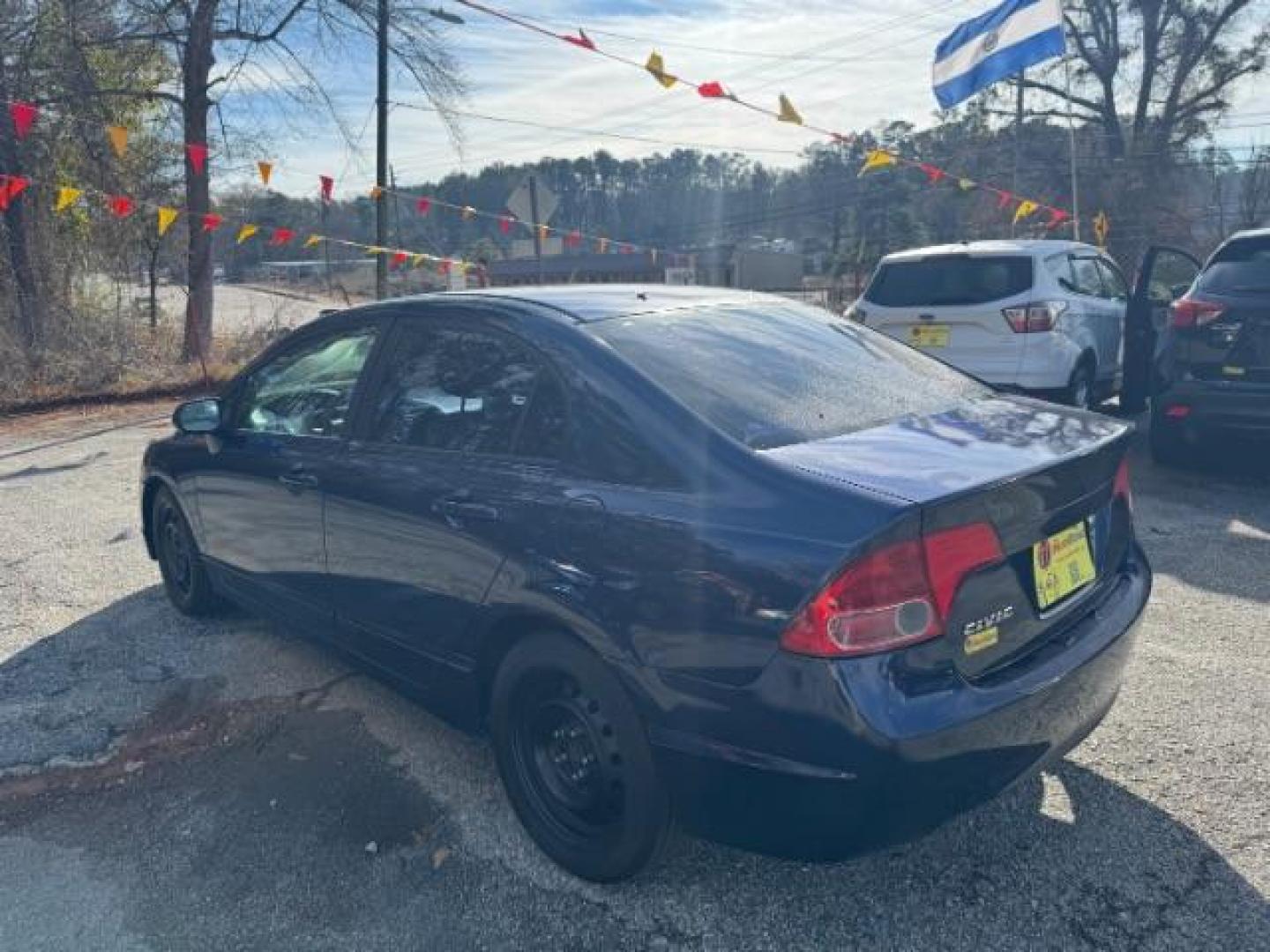 2007 Blue Honda Civic LX Sedan AT (1HGFA16527L) with an 1.8L L4 SOHC 16V engine, 5-Speed Automatic transmission, located at 1806 Veterans Memorial Hwy SW, Austell, GA, 30168, (770) 944-9558, 33.817959, -84.606987 - Photo#5