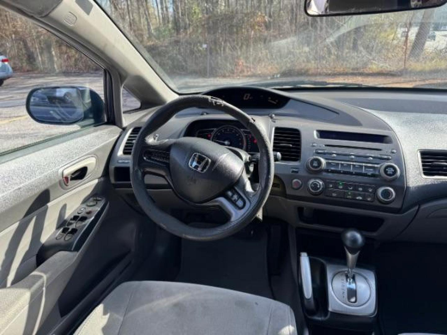 2007 Blue Honda Civic LX Sedan AT (1HGFA16527L) with an 1.8L L4 SOHC 16V engine, 5-Speed Automatic transmission, located at 1806 Veterans Memorial Hwy SW, Austell, GA, 30168, (770) 944-9558, 33.817959, -84.606987 - Photo#12