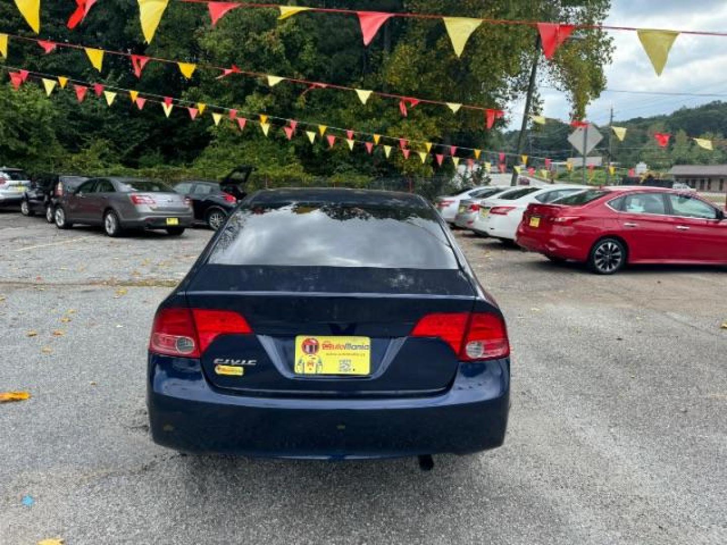 2007 Blue Honda Civic LX Sedan AT (1HGFA16527L) with an 1.8L L4 SOHC 16V engine, 5-Speed Automatic transmission, located at 1806 Veterans Memorial Hwy SW, Austell, GA, 30168, (770) 944-9558, 33.817959, -84.606987 - Photo#4