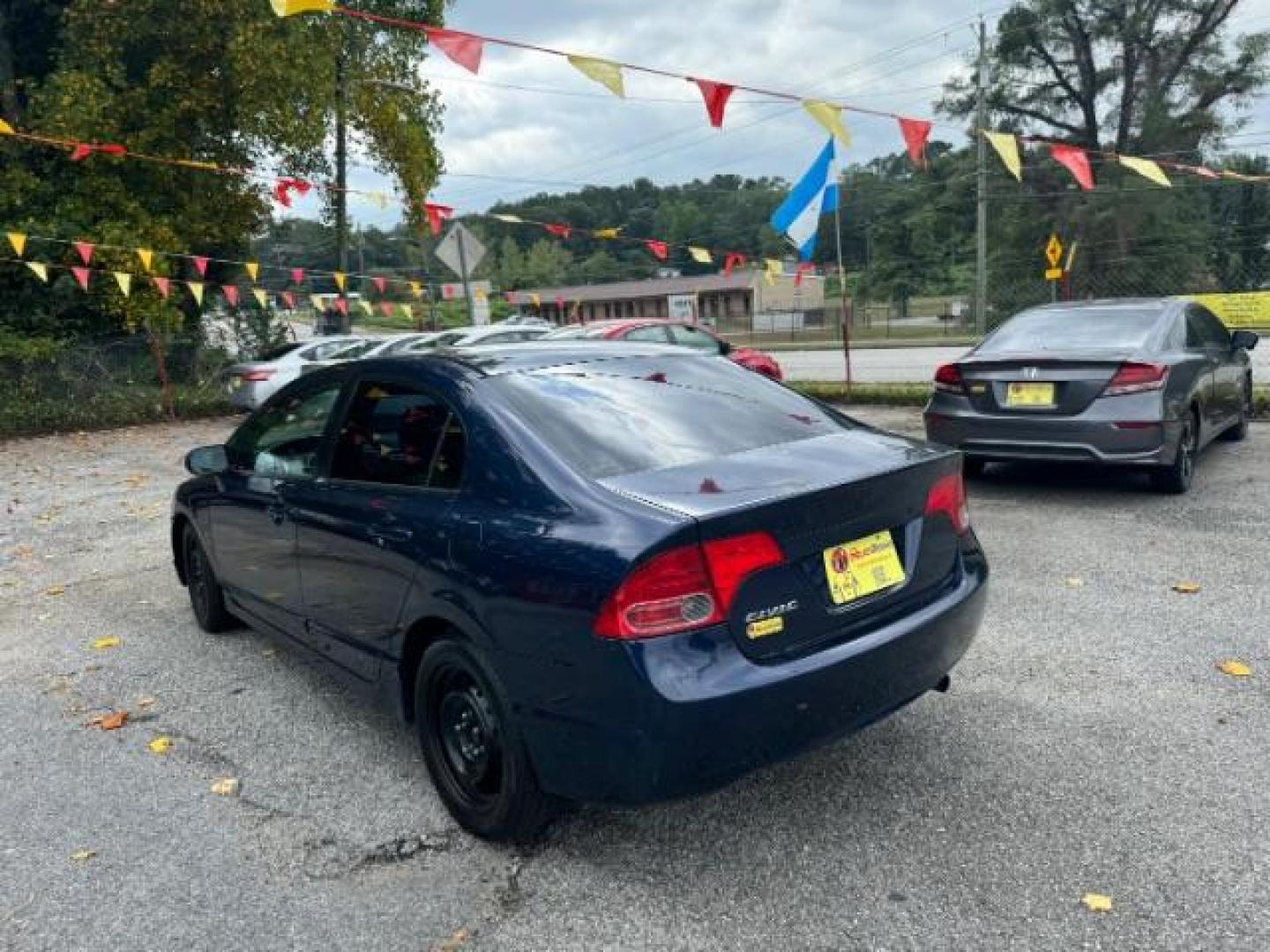 2007 Blue Honda Civic LX Sedan AT (1HGFA16527L) with an 1.8L L4 SOHC 16V engine, 5-Speed Automatic transmission, located at 1806 Veterans Memorial Hwy SW, Austell, GA, 30168, (770) 944-9558, 33.817959, -84.606987 - Photo#5