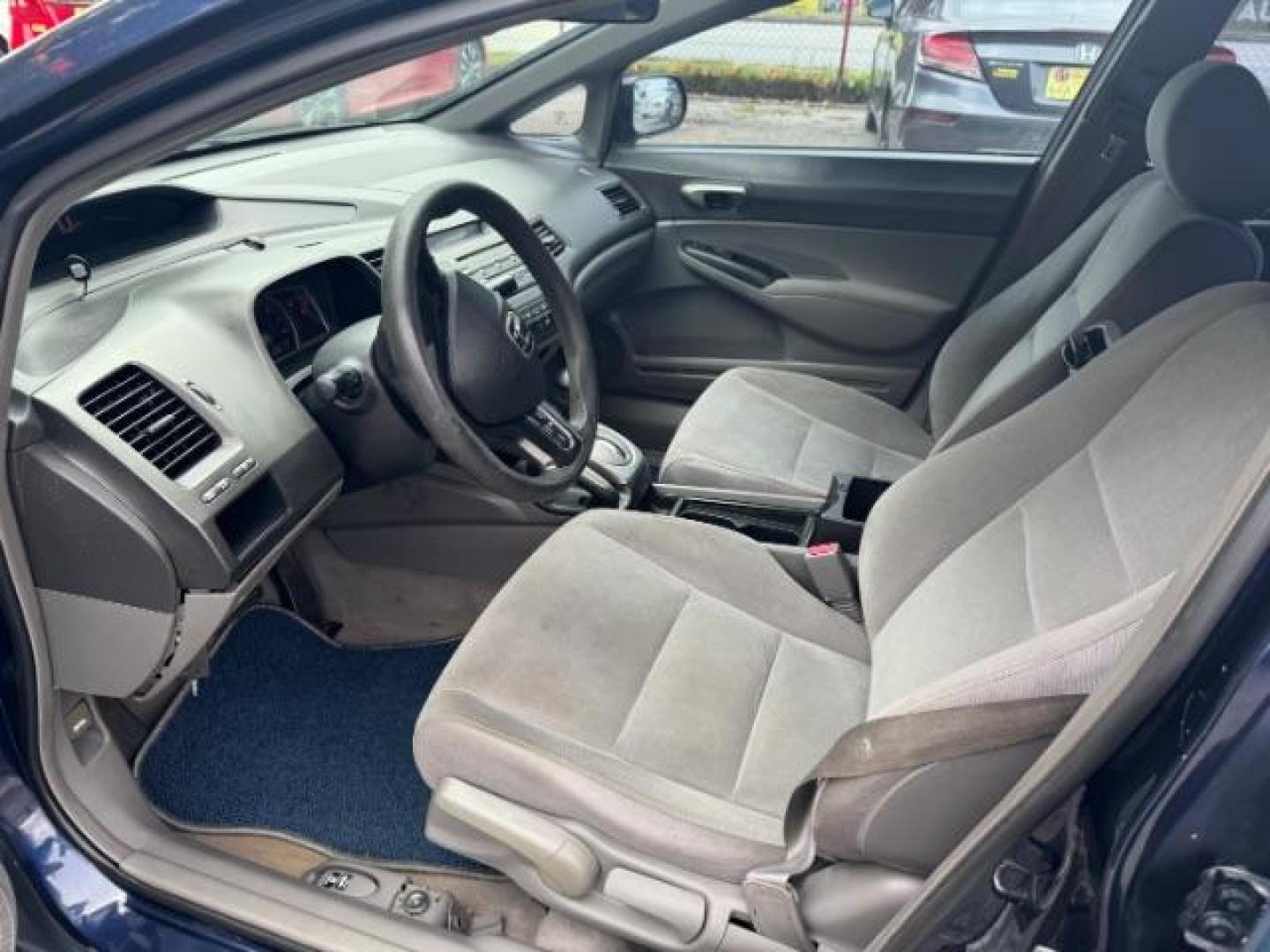 2007 Blue Honda Civic LX Sedan AT (1HGFA16527L) with an 1.8L L4 SOHC 16V engine, 5-Speed Automatic transmission, located at 1806 Veterans Memorial Hwy SW, Austell, GA, 30168, (770) 944-9558, 33.817959, -84.606987 - Photo#6