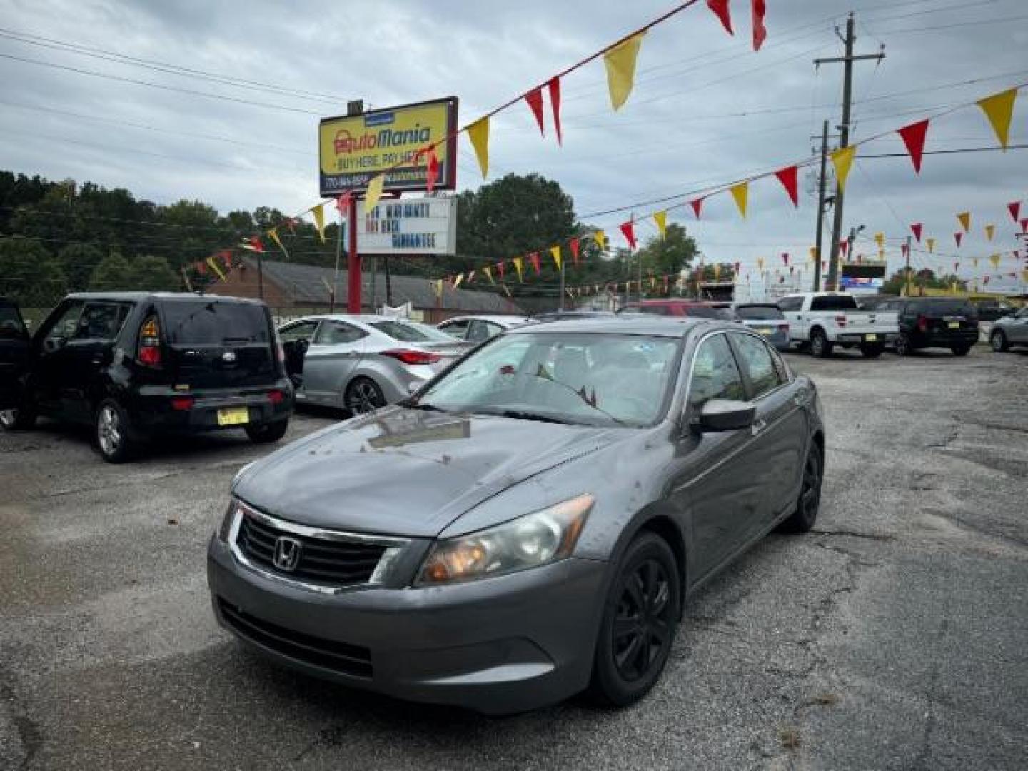 2009 Gray Honda Accord LX Sedan AT (1HGCP26329A) with an 2.4L L4 DOHC 16V engine, 5-Speed Automatic transmission, located at 1806 Veterans Memorial Hwy SW, Austell, GA, 30168, (770) 944-9558, 33.817959, -84.606987 - Photo#0