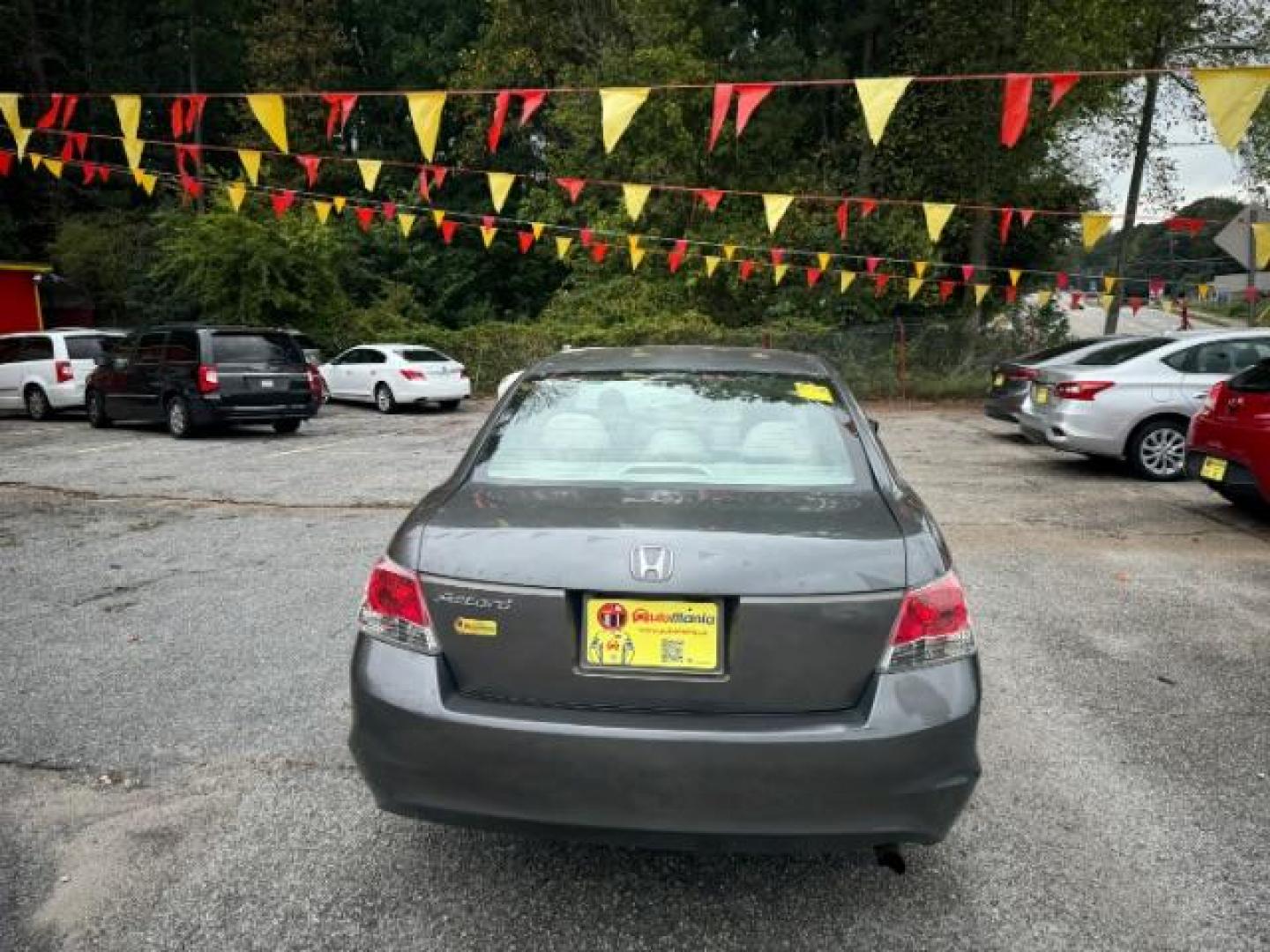 2009 Gray Honda Accord LX Sedan AT (1HGCP26329A) with an 2.4L L4 DOHC 16V engine, 5-Speed Automatic transmission, located at 1806 Veterans Memorial Hwy SW, Austell, GA, 30168, (770) 944-9558, 33.817959, -84.606987 - Photo#2