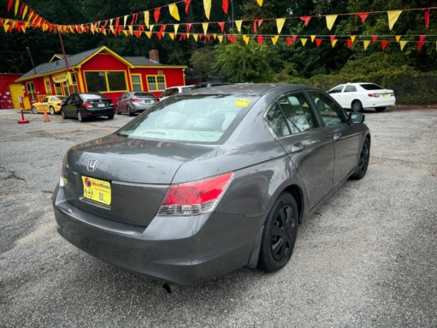 2009 Gray Honda Accord LX Sedan AT (1HGCP26329A) with an 2.4L L4 DOHC 16V engine, 5-Speed Automatic transmission, located at 1806 Veterans Memorial Hwy SW, Austell, GA, 30168, (770) 944-9558, 33.817959, -84.606987 - Photo#3