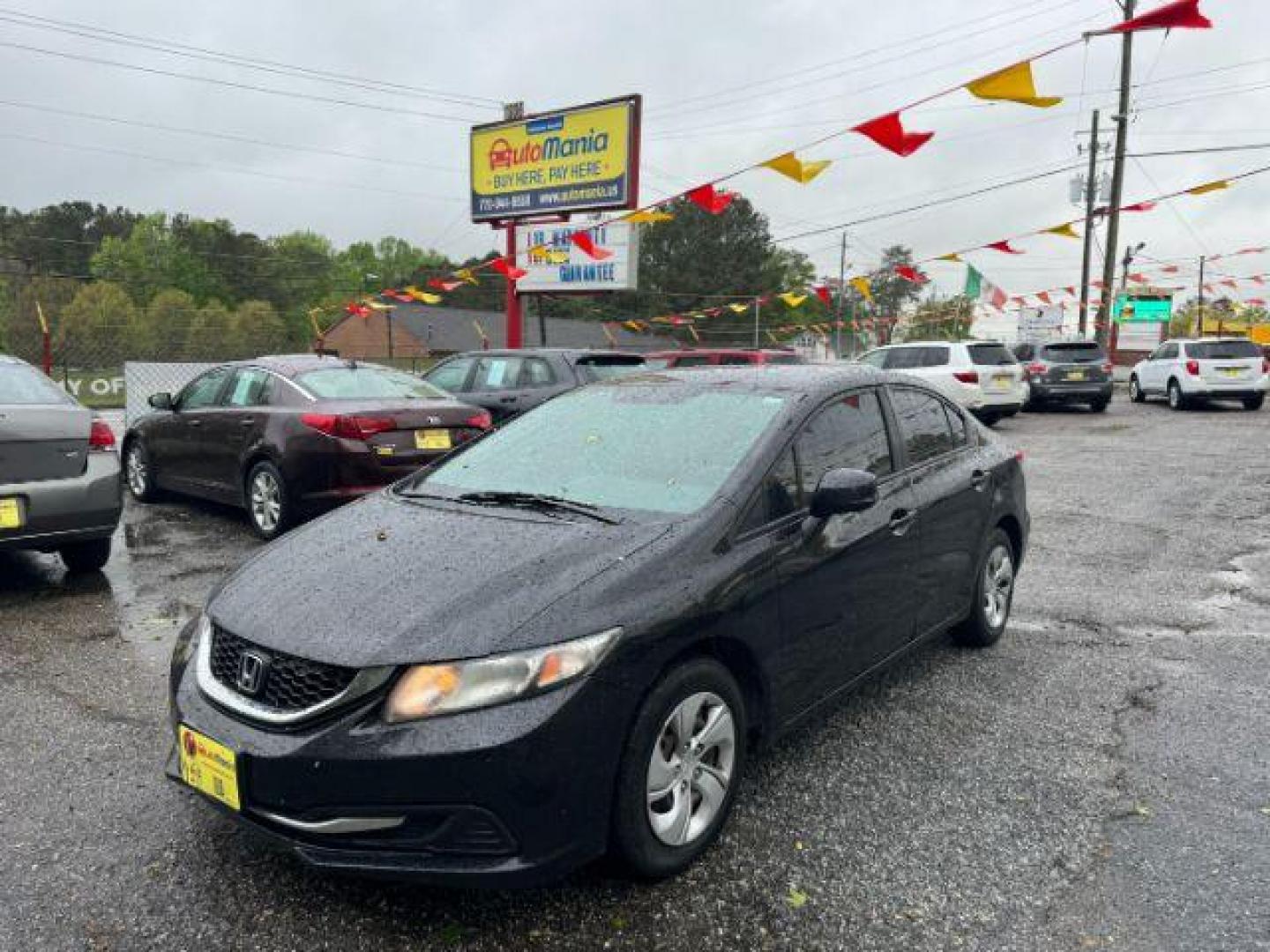 2013 Black Honda Civic LX Sedan 5-Speed AT (19XFB2F59DE) with an 1.8L L4 SOHC 16V engine, 5-Speed Automatic transmission, located at 1806 Veterans Memorial Hwy SW, Austell, GA, 30168, (770) 944-9558, 33.817959, -84.606987 - Photo#0