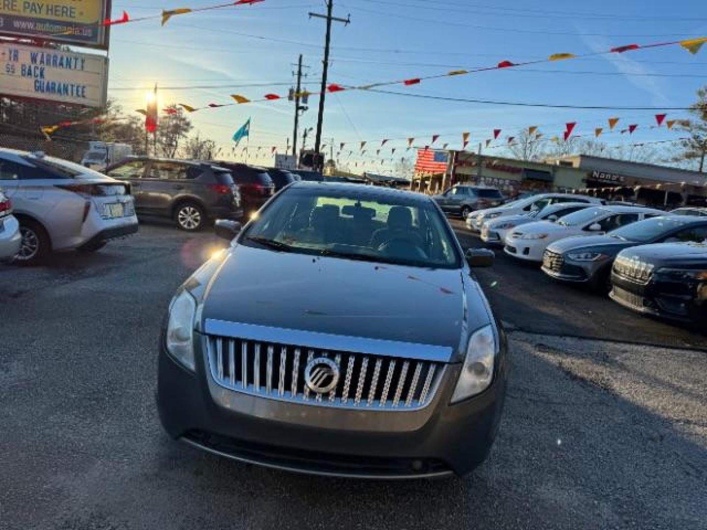 2010 Gray Mercury Milan I4 (3MEHM0HA1AR) with an 2.5L L4 DOHC 16V engine, 5-Speed Automatic transmission, located at 1806 Veterans Memorial Hwy SW, Austell, GA, 30168, (770) 944-9558, 33.817959, -84.606987 - Photo#1