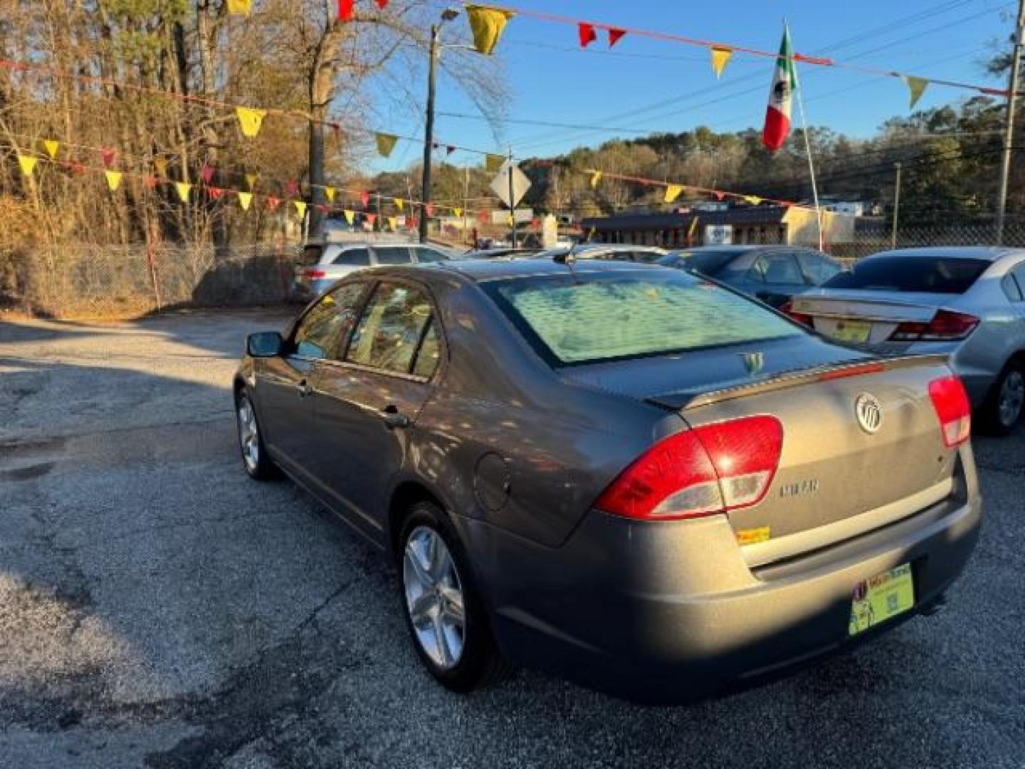 2010 Gray Mercury Milan I4 (3MEHM0HA1AR) with an 2.5L L4 DOHC 16V engine, 5-Speed Automatic transmission, located at 1806 Veterans Memorial Hwy SW, Austell, GA, 30168, (770) 944-9558, 33.817959, -84.606987 - Photo#5