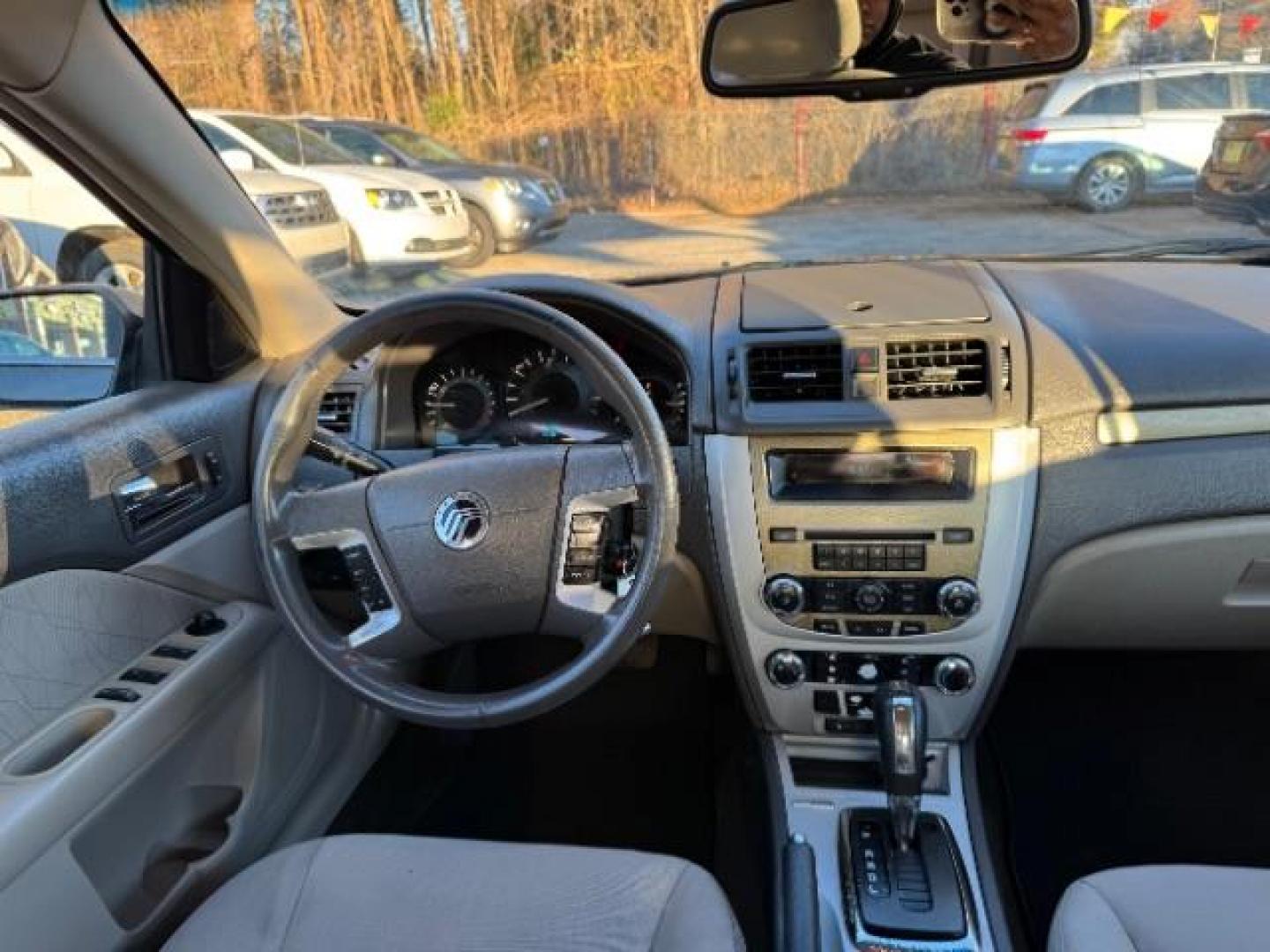 2010 Gray Mercury Milan I4 (3MEHM0HA1AR) with an 2.5L L4 DOHC 16V engine, 5-Speed Automatic transmission, located at 1806 Veterans Memorial Hwy SW, Austell, GA, 30168, (770) 944-9558, 33.817959, -84.606987 - Photo#12