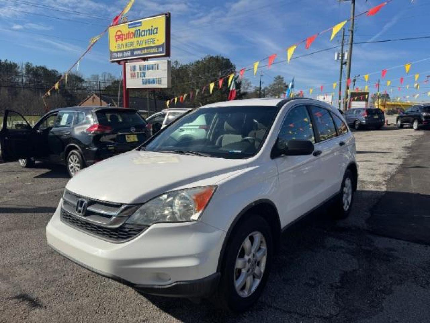 2011 White Honda CR-V SE 2WD 5-Speed AT (5J6RE3H45BL) with an 2.4L L4 DOHC 16V engine, 5-Speed Automatic transmission, located at 1806 Veterans Memorial Hwy SW, Austell, GA, 30168, (770) 944-9558, 33.817959, -84.606987 - Photo#0