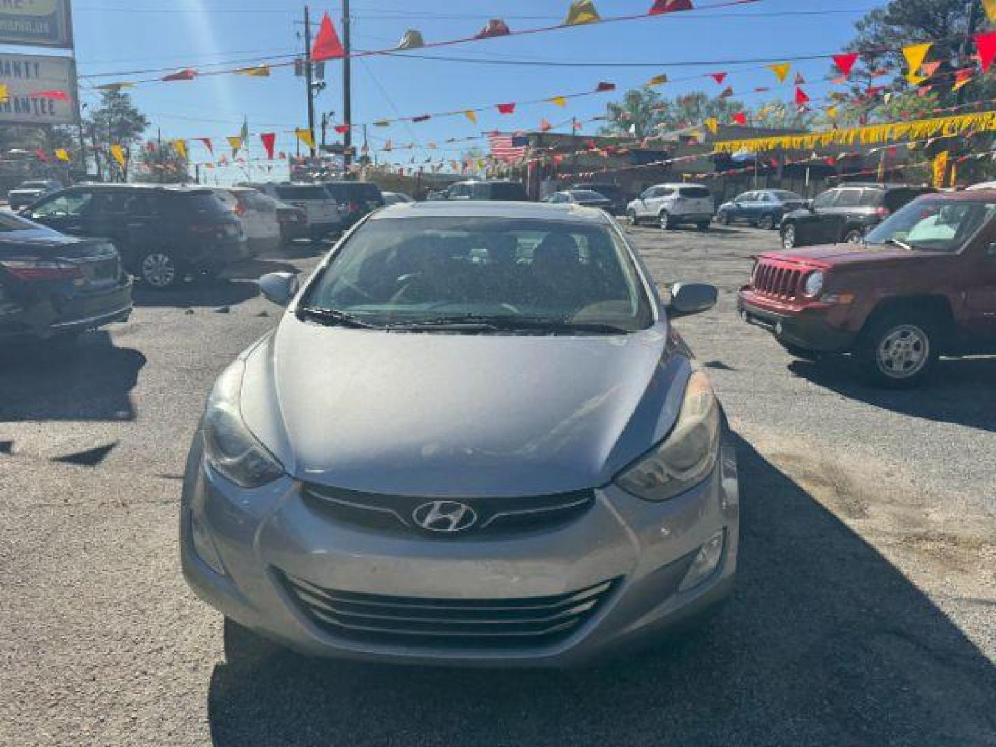 2013 Silver Hyundai Elantra Limited (KMHDH4AE4DU) with an 1.8L L4 DOHC 16V engine, 6-Speed Automatic transmission, located at 1806 Veterans Memorial Hwy SW, Austell, GA, 30168, (770) 944-9558, 33.817959, -84.606987 - Photo#1