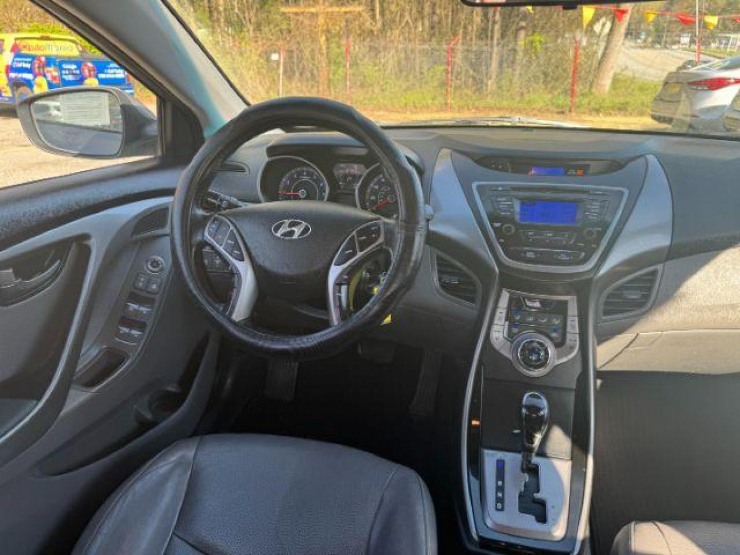 2013 Silver Hyundai Elantra Limited (KMHDH4AE4DU) with an 1.8L L4 DOHC 16V engine, 6-Speed Automatic transmission, located at 1806 Veterans Memorial Hwy SW, Austell, GA, 30168, (770) 944-9558, 33.817959, -84.606987 - Photo#12