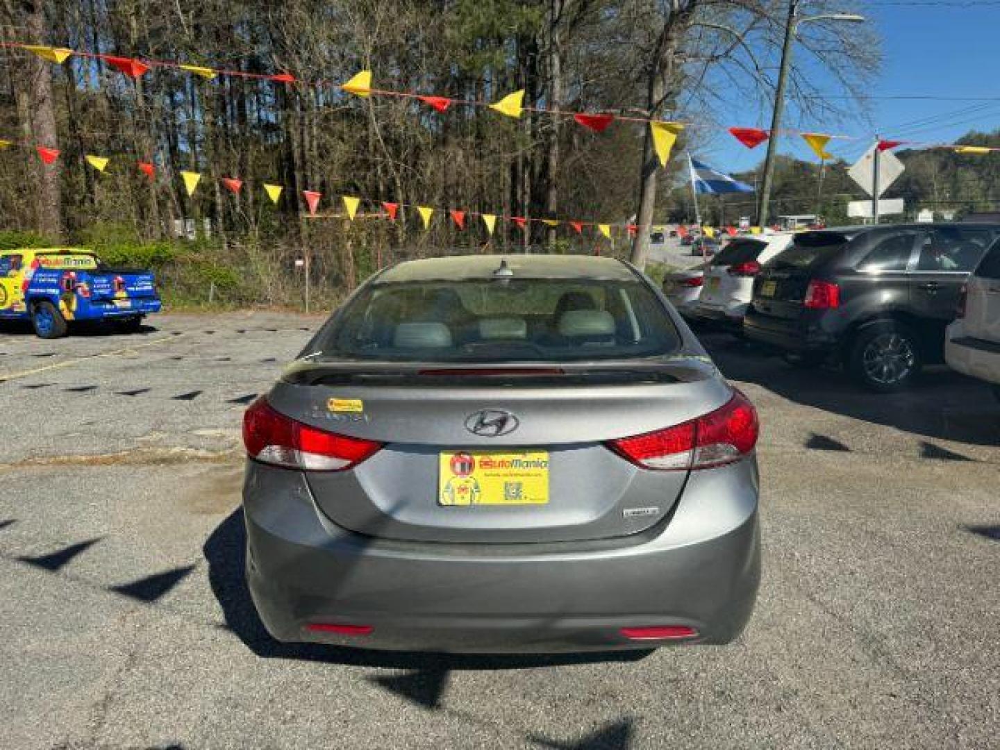 2013 Silver Hyundai Elantra Limited (KMHDH4AE4DU) with an 1.8L L4 DOHC 16V engine, 6-Speed Automatic transmission, located at 1806 Veterans Memorial Hwy SW, Austell, GA, 30168, (770) 944-9558, 33.817959, -84.606987 - Photo#4